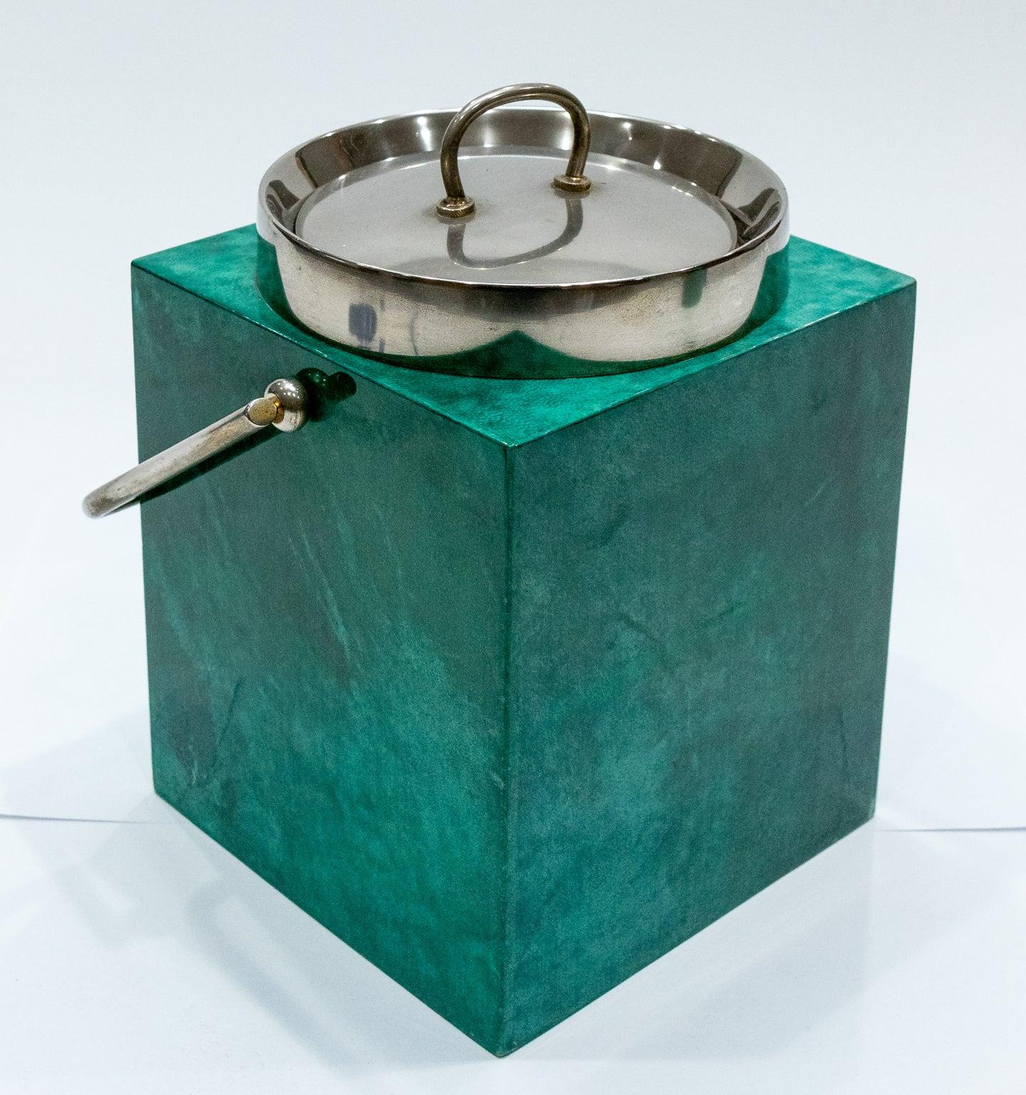 Aldo Tura varnished green goatskin wrapped ice bucket with metal handle and lid, manufactured in Italy during the 1960s. Please note wear consistent with age.
 