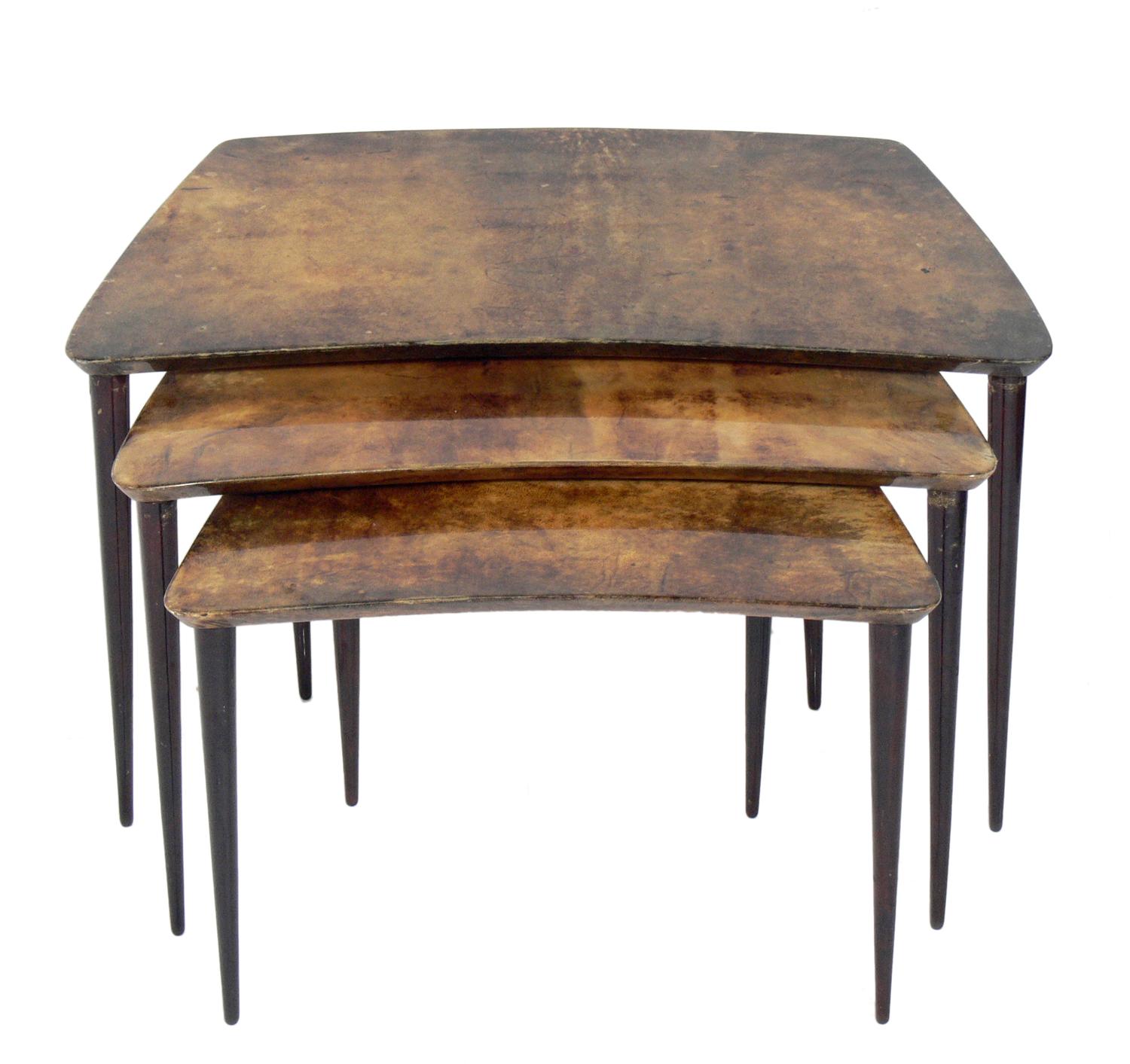 Set of Italian goatskin or parchment nesting tables, designed by Aldo Tura, Italy, circa 1950s. The large table measures 16.25