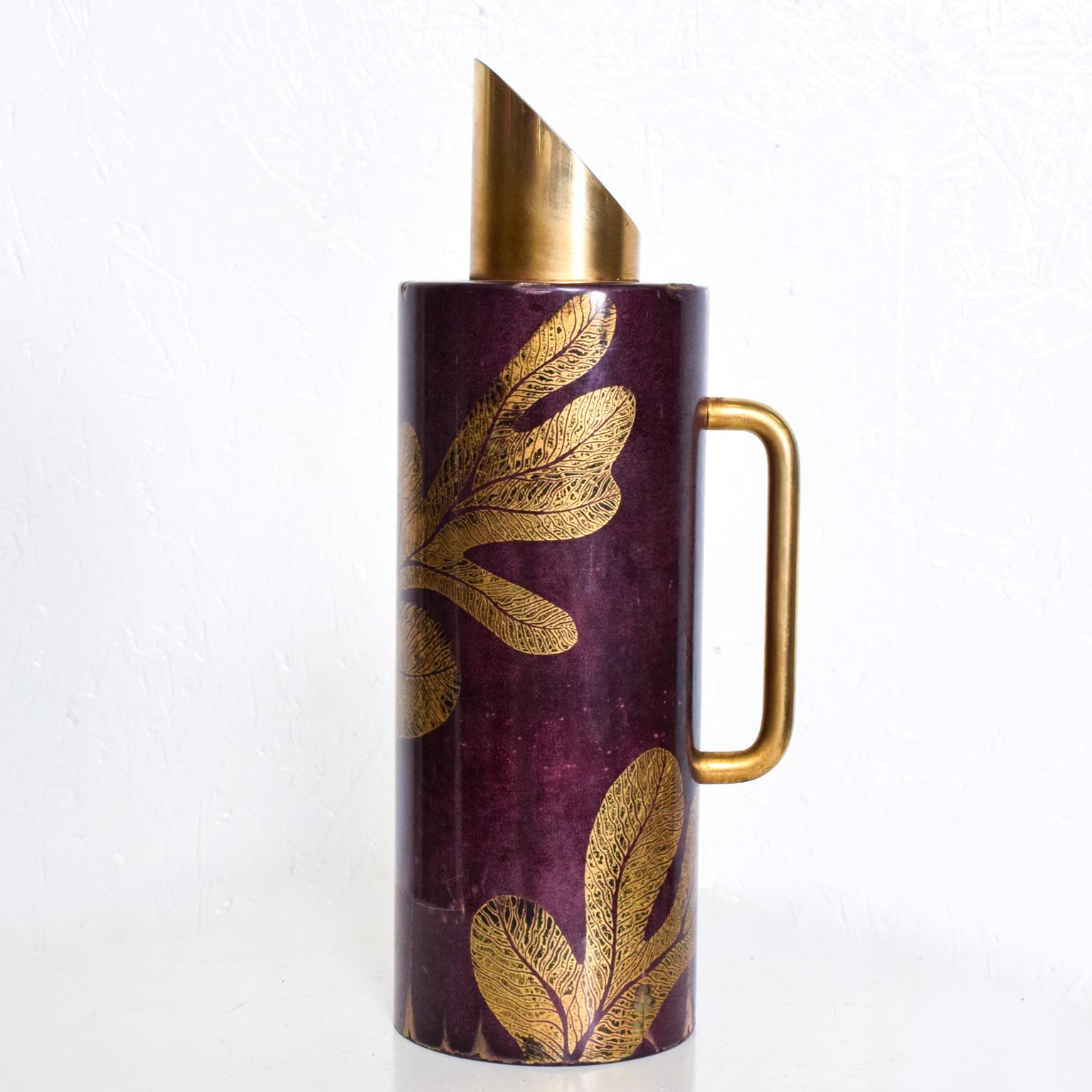For your consideration, an Aldo Tura Goatskin pitcher, Italian Mid-Century Modern, purple and gold Leaf. Made in Italy, circa 1950s. 

Wood covered in goatskin finished with purple color and gold leaf motifs. Original lacquer finish. The mercury
