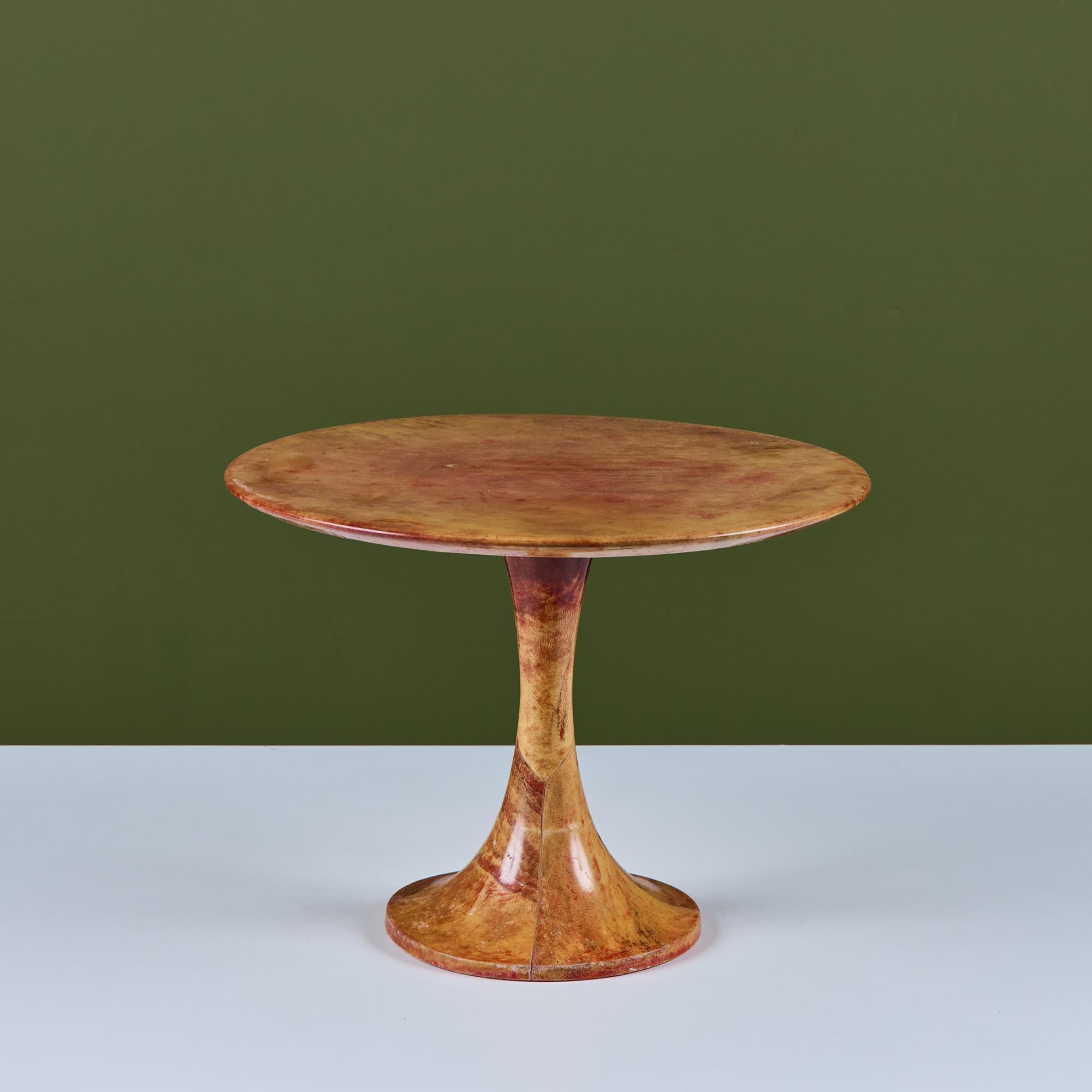 Petite side table by Aldo Tura, c.1960s Italy, features a parchment wood frame wrapped in goatskin with a smooth lacquered finish.

Dimensions
15.75