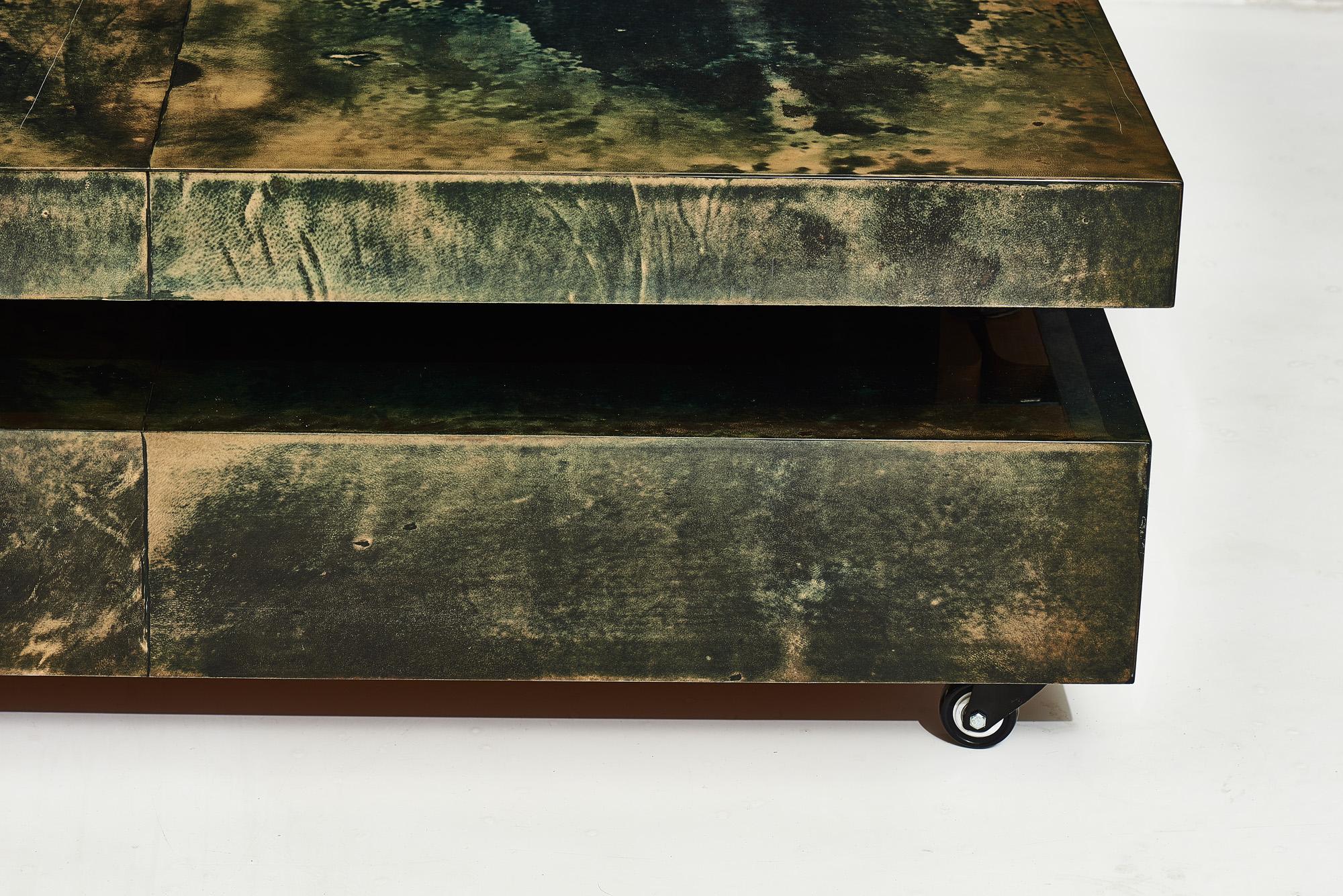 Aldo Tura green goat skin lacquered coffee table. Italy 1970. Top of table extends for additional surface/further reach.