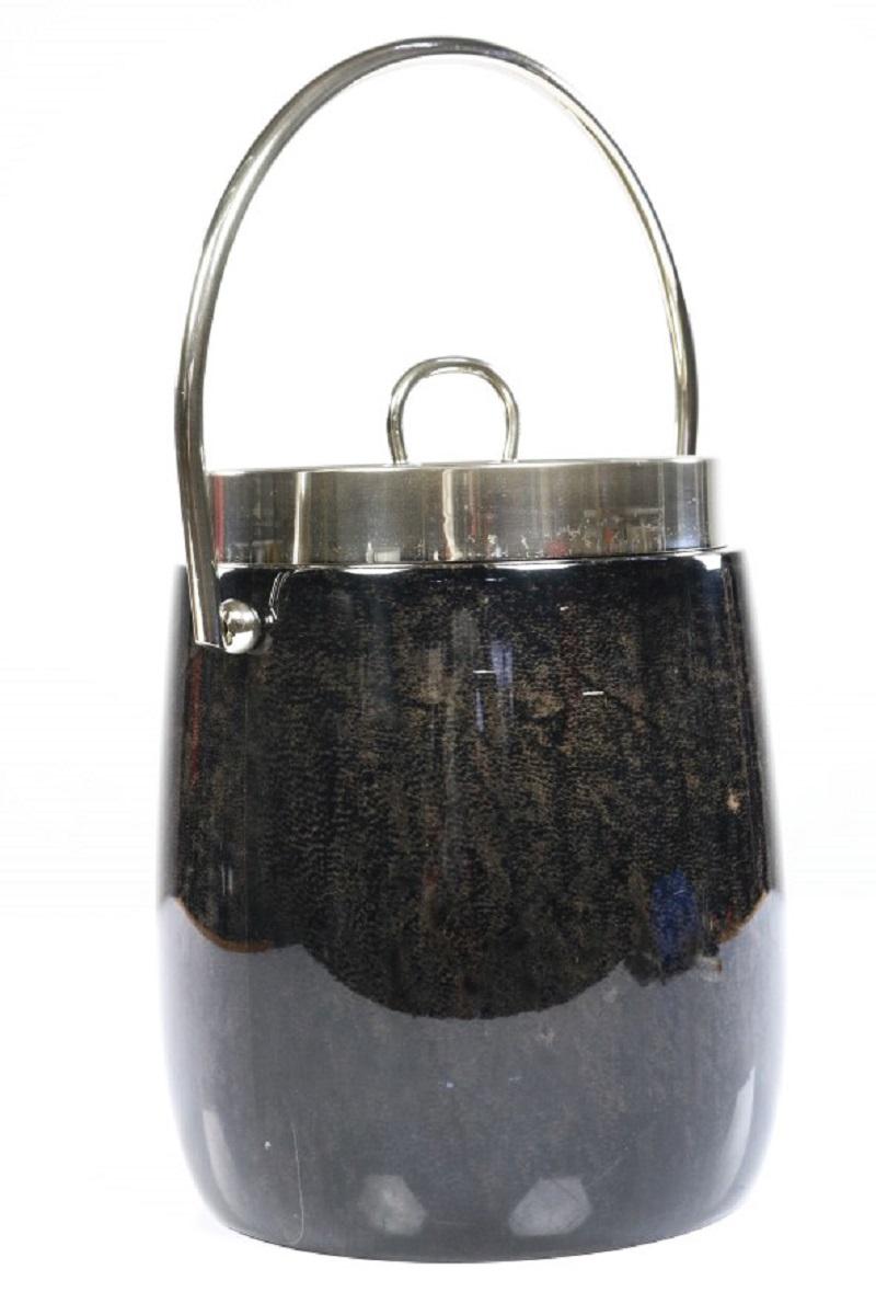 Aldo Tura ice bucket 1960s wooden chassis with lacquered goat skin covered
(black marbled) the glass inside is copper colored
handle, cover and border silver plated. 
in fine condition
Measures: diameter body 18.2 cm (7.2