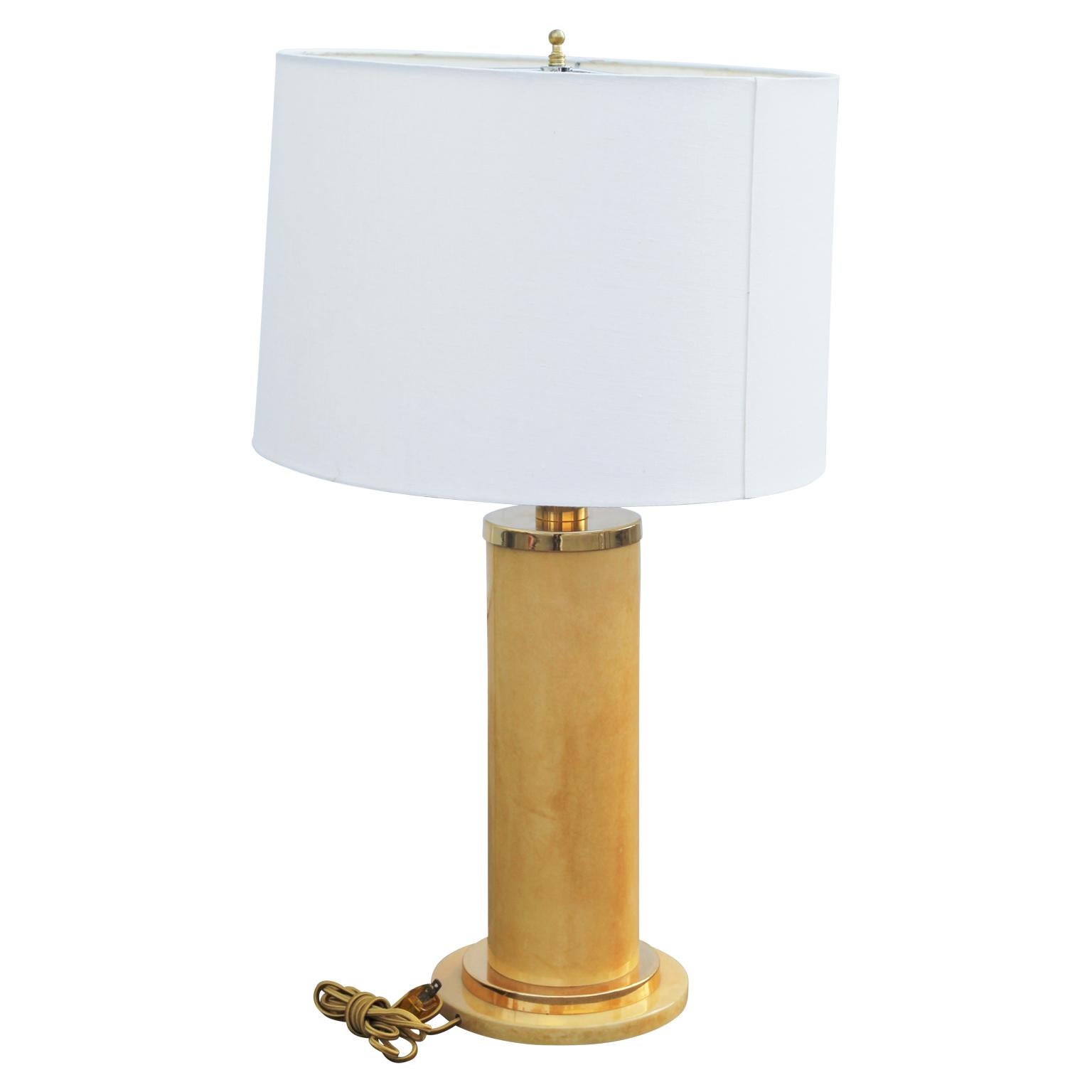 1980s goatskin table lamp in the style of Aldo Tura. Comes with the white shade displayed in the photo.