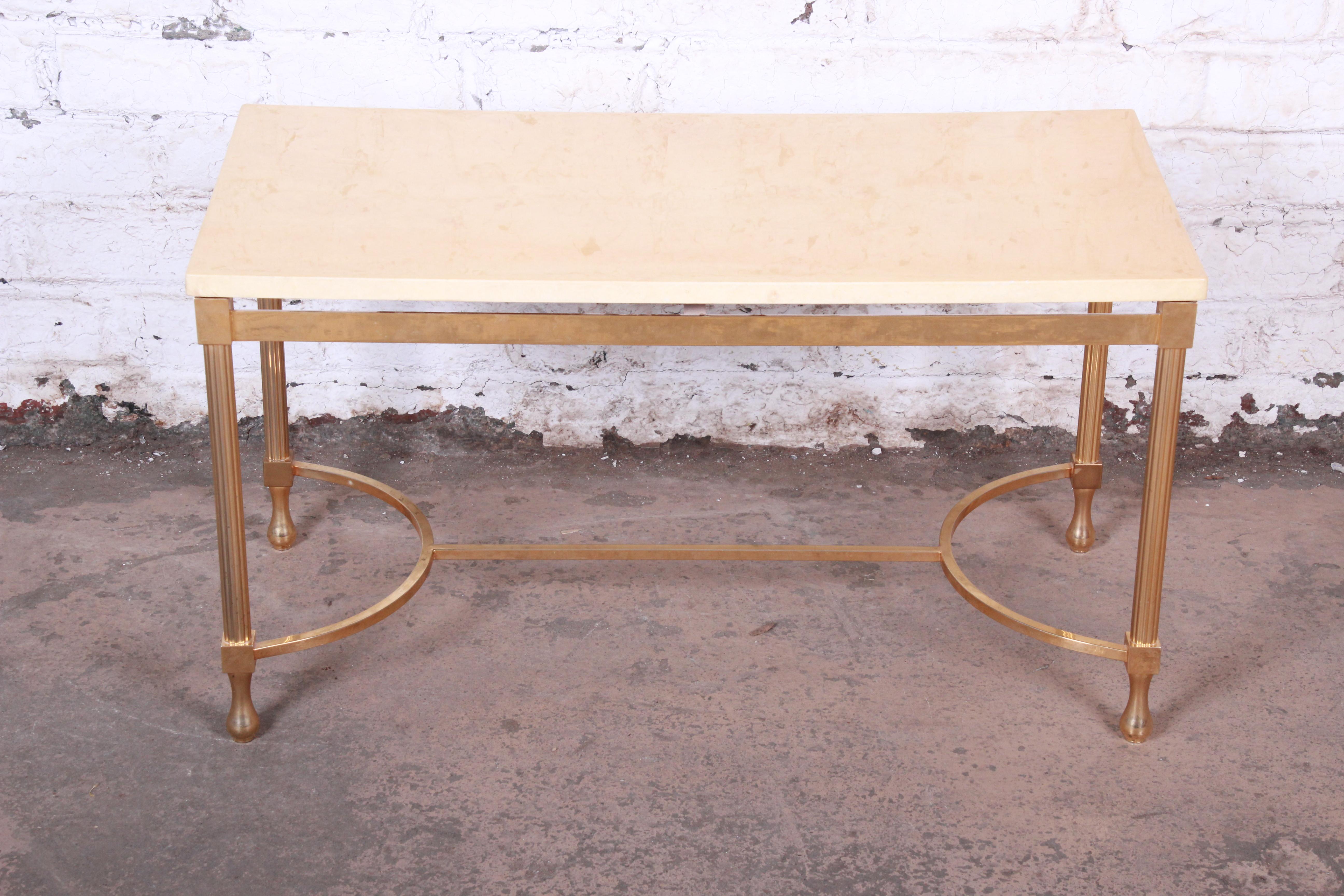 A gorgeous midcentury Italian modern coffee or cocktail table

By Aldo Tura

Italy, 1960s

Faux marble and gilded brass

Measures: 35.25