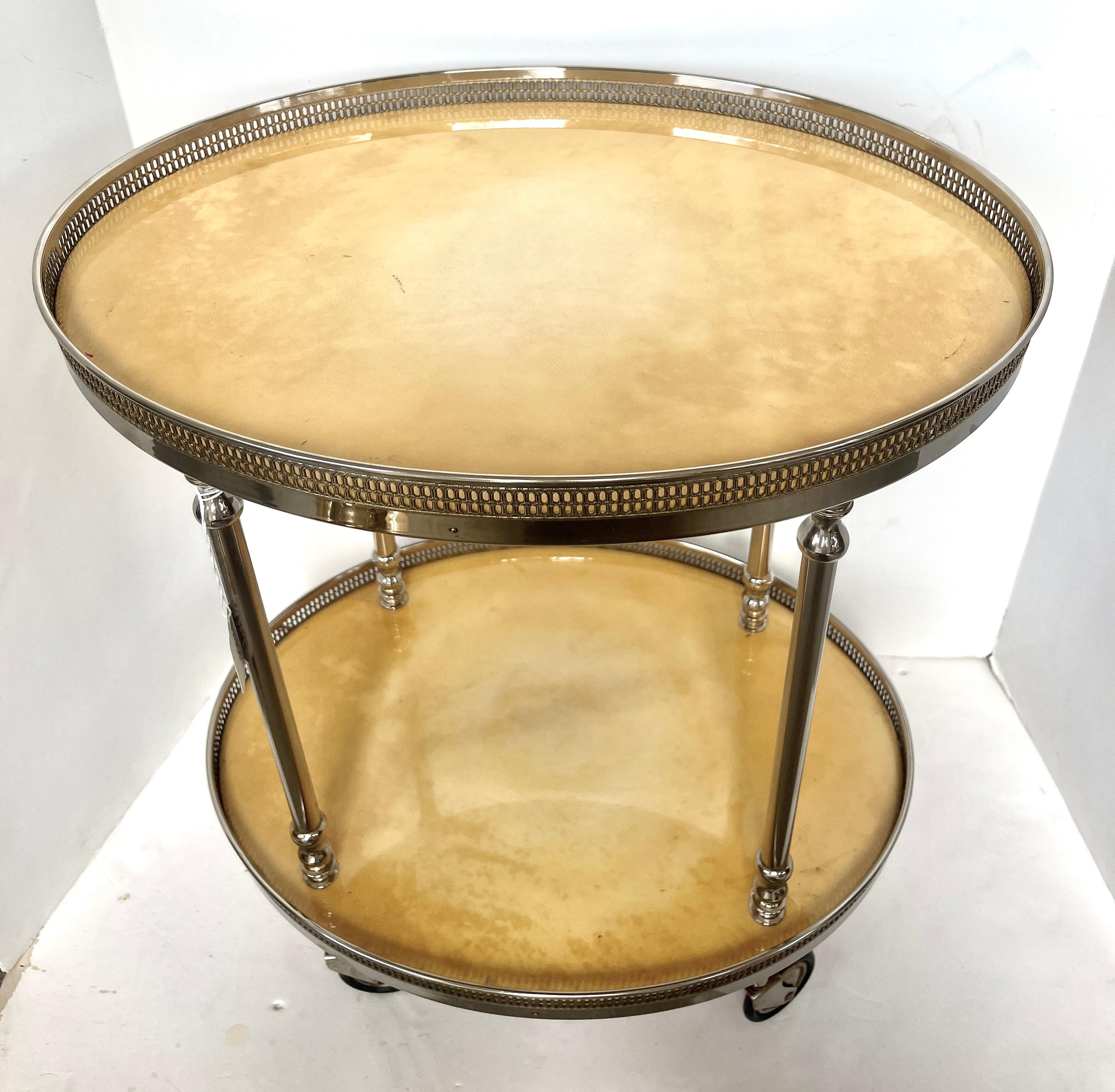 Just in, this exceptional Italian C.1960s Rolling Bar-cart, Silver Plate & Goatskin by Aldo Tura.
This bar-cart is on wheels and has been recently polished.
Very good to excellent vintage condition, consistent with age and use.
Please view all large