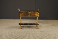 Carrello da bar a due ante a goccia in pelle di capra laccata e ottone di Aldo Tura, anni '50