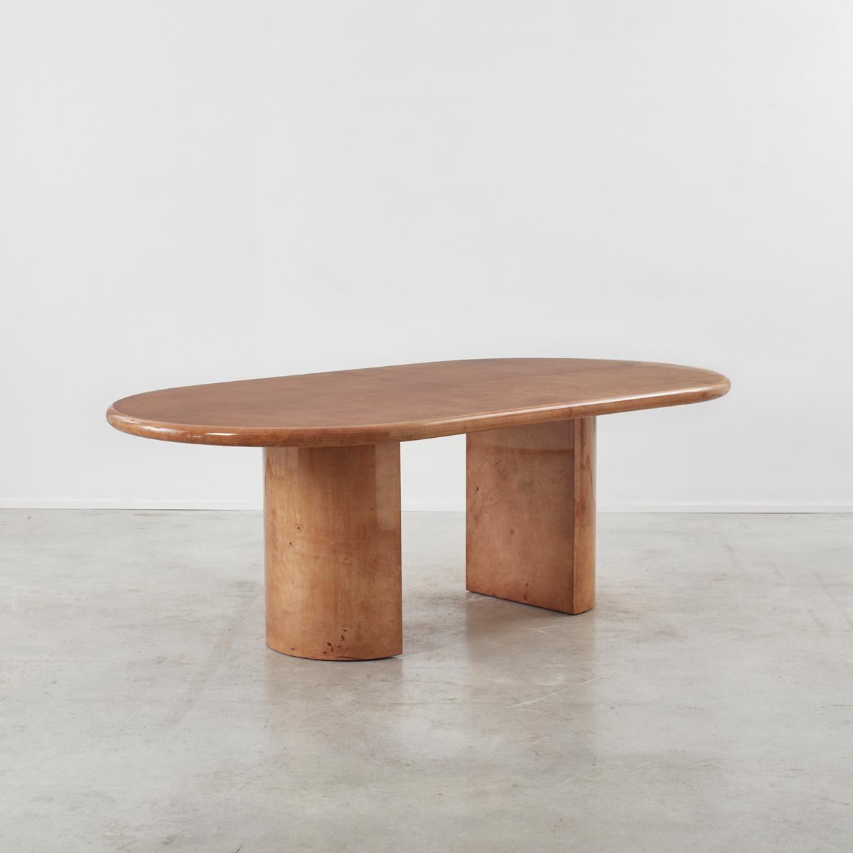 Aldo Tura (1909-1963) was a hands-on designer who experimented greatly with traditional craftsmanship hand applied craft processes and finishes out of his workshop in Milan. He is best known for his tables and lamps, which drew on shapes from the