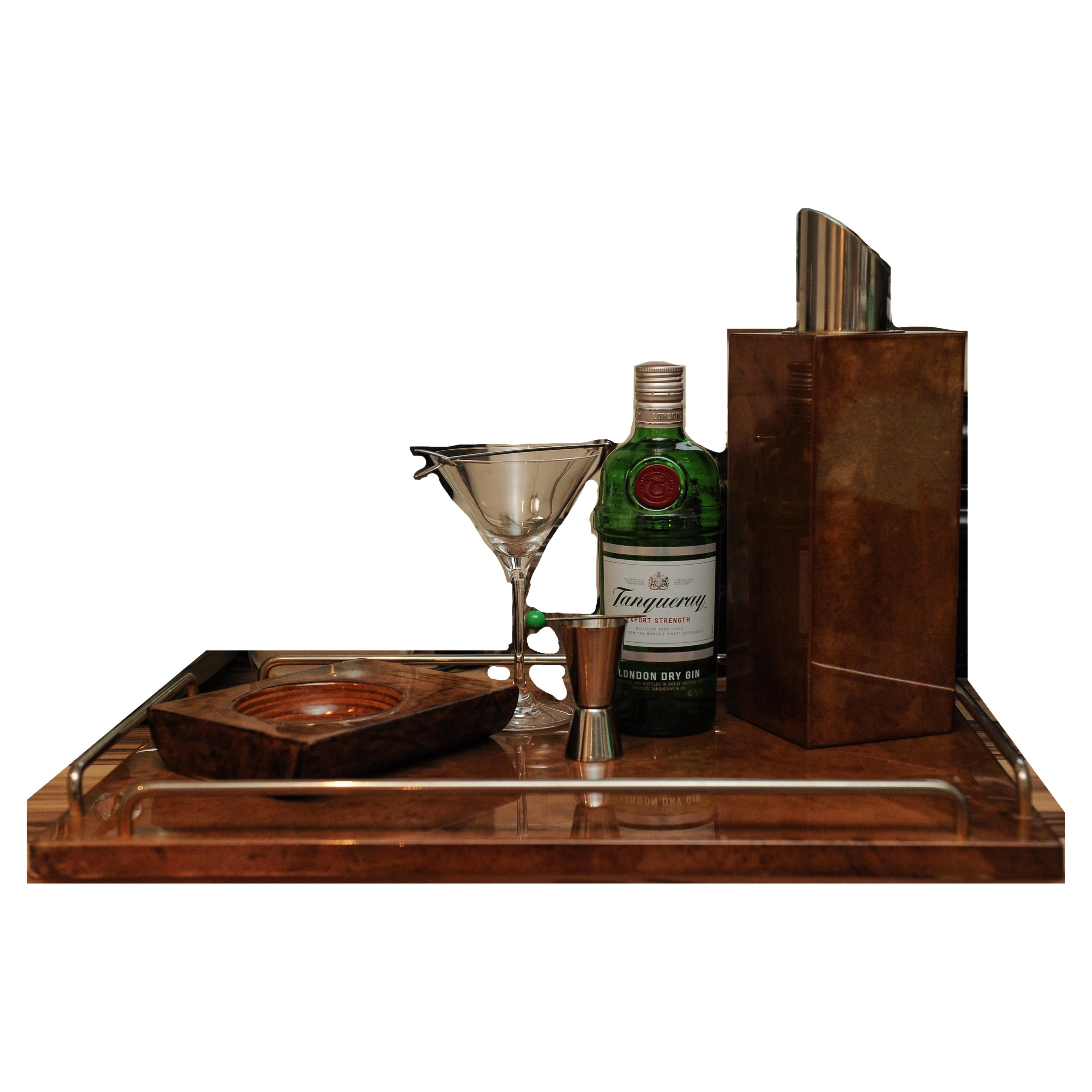 Aldo Tura Mid Century  Impressive Lacquered Goatskin and Steel Cocktail Set With Ashtray, Ice Bucket, Cocktail Server & Tray 1950's

An impressive Art Deco style set of barware accessories, with crisp art deco symmetry of varying heights akin to the