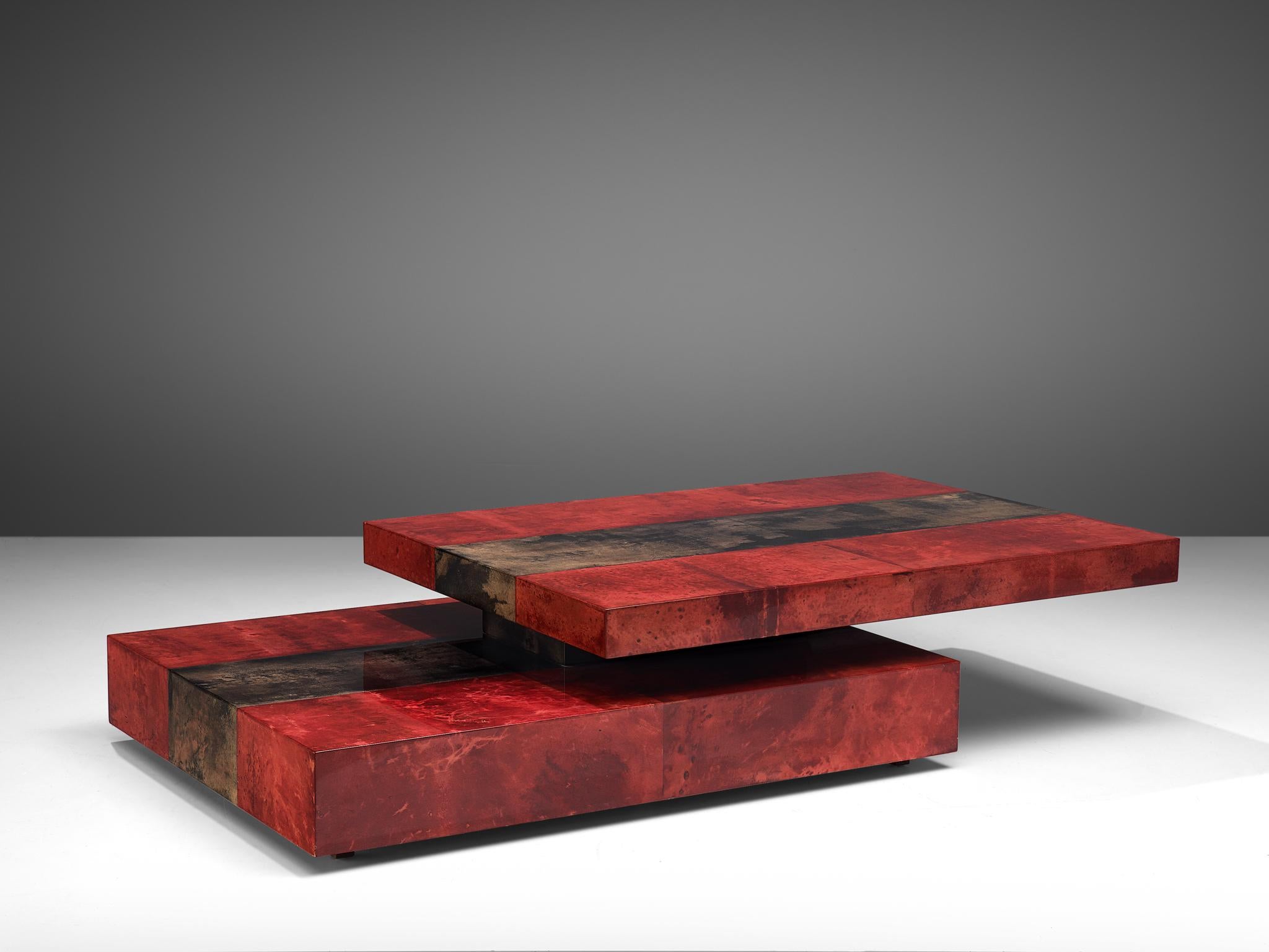 Aldo Tura, cocktail table, wooden and parchment, Italy, 1970s

This coffee table is by Italian designer and maker, Aldo Tura. Wrapped in dark red and dark brown parchment with deep marbled veining and a high gloss lacquered finish. The top can be