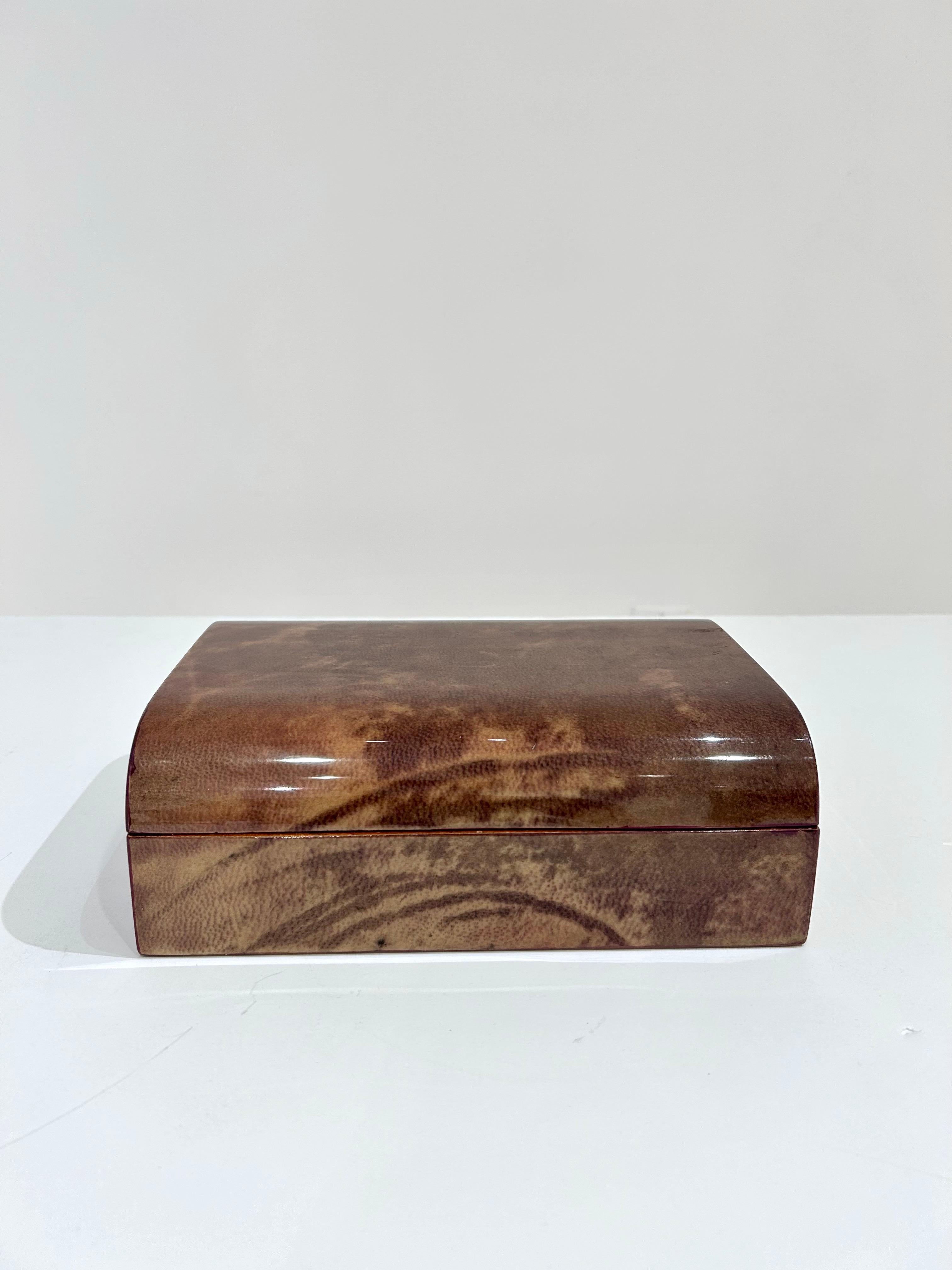 Jewelry box in lacquered parchment and wood by Aldo Tura. Italy, circa 1960s.
