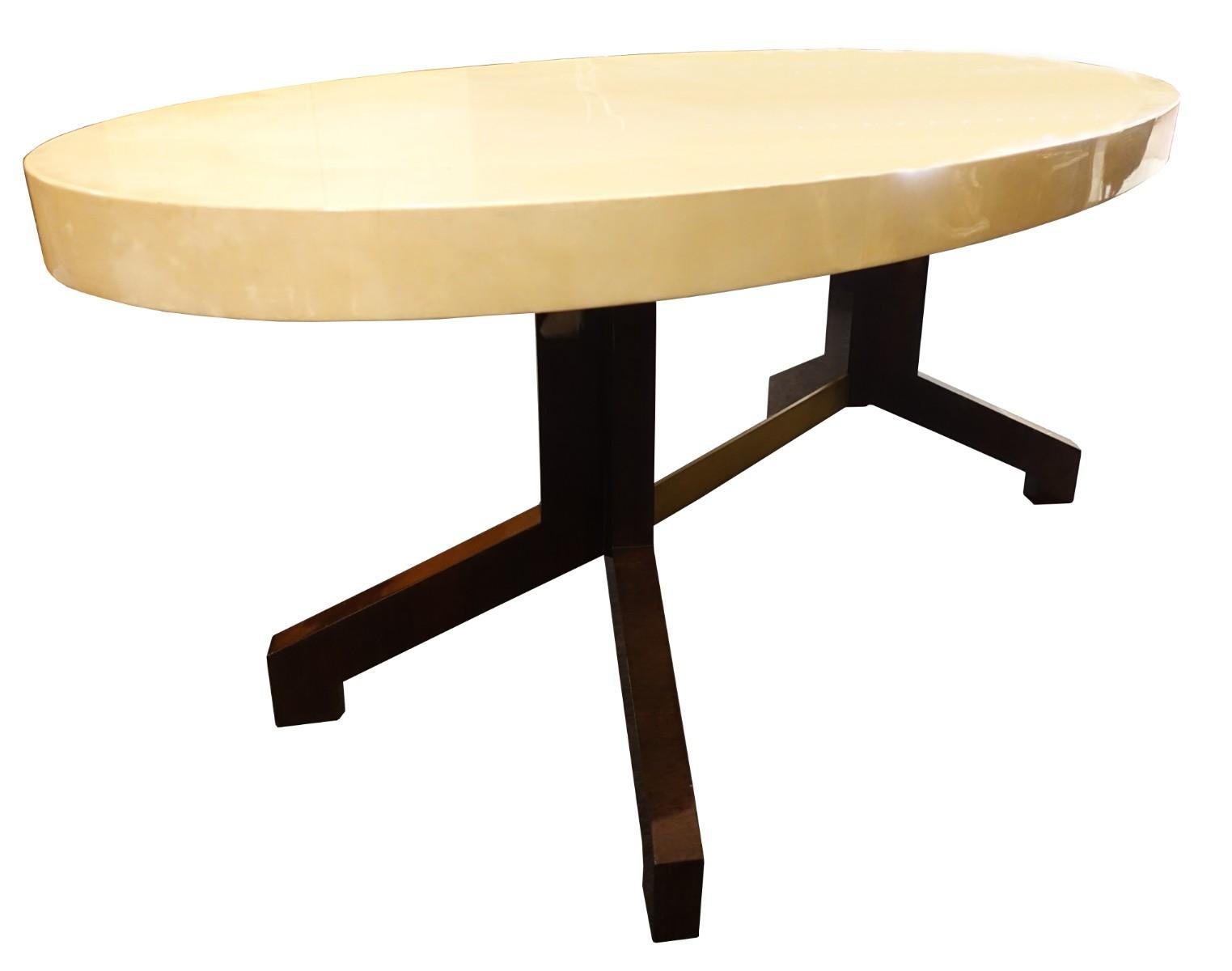 Aldo Tura parchment oval table and eight chairs, 1950-1960

Measures: Width: Table 190 cm, chairs 59 cm
Height: Table 76 cm, chairs 120 cm
Depth: Table 95 cm, chairs 47 cm.
