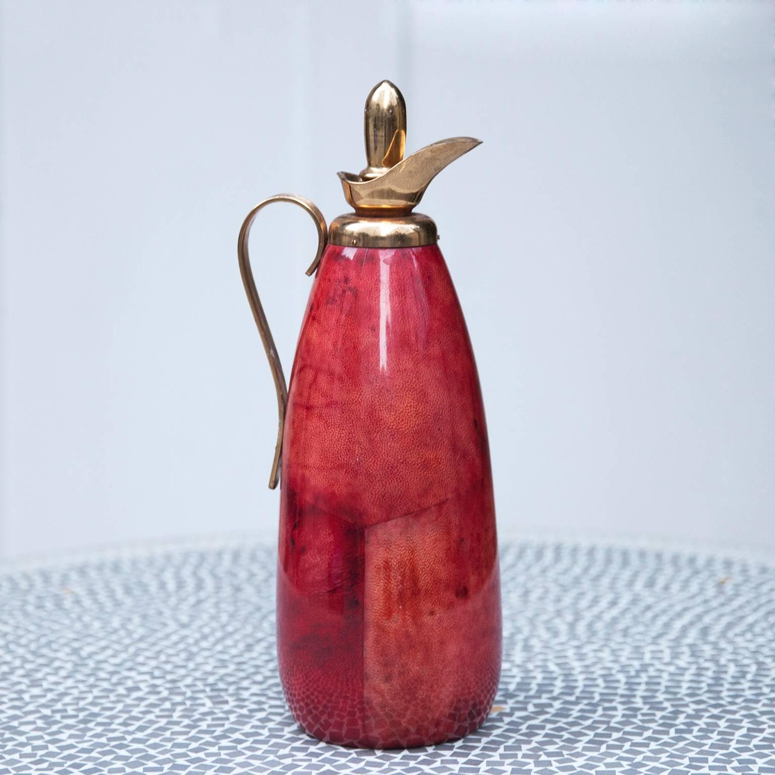 Wonderful red colored goatskin Aldo Tura pitcher made in the 1970.