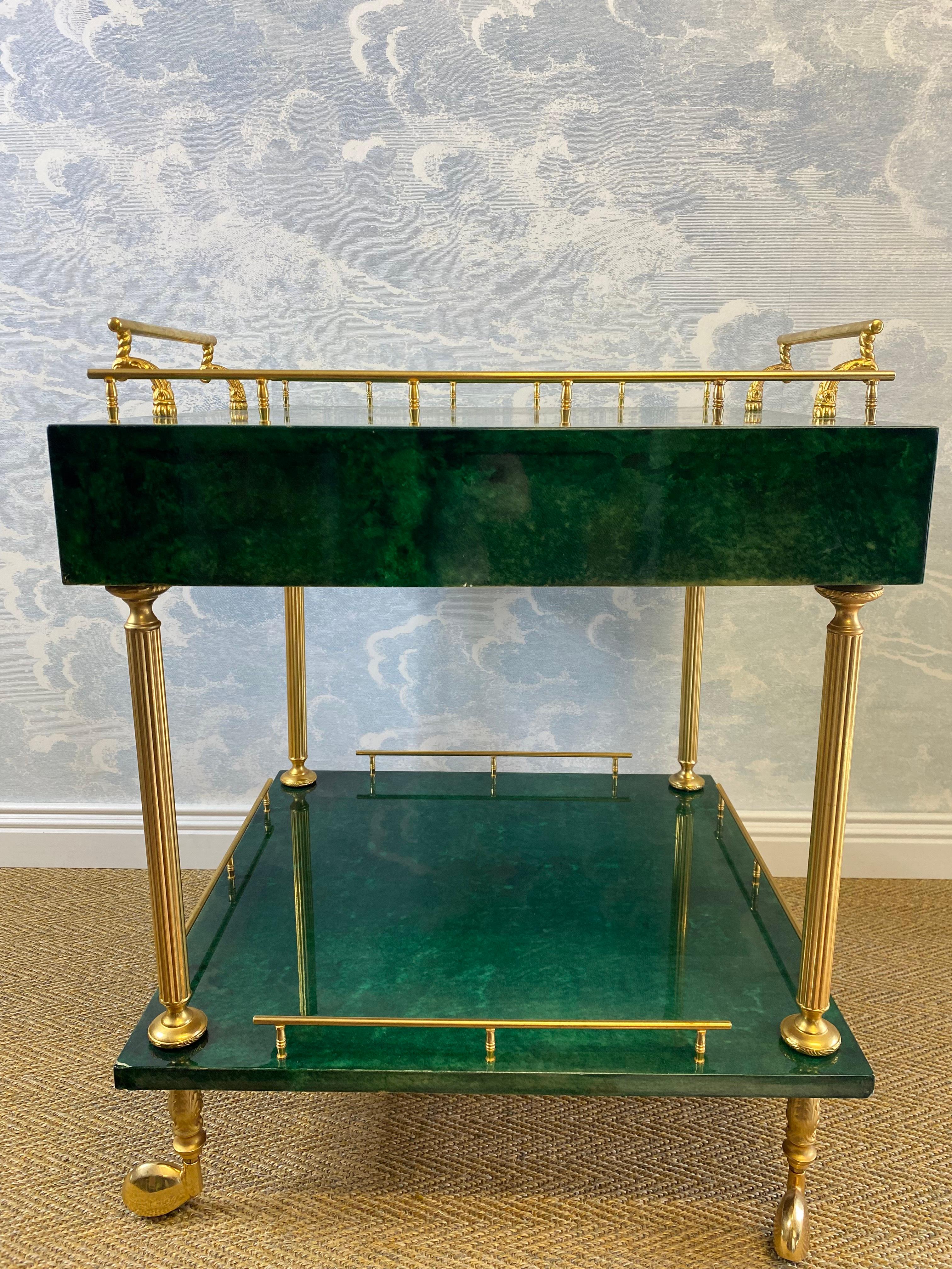 Hollywood Regency Aldo Tura Side Table on Wheels in Emerald Green with Brass Detail and 2 Drawers For Sale
