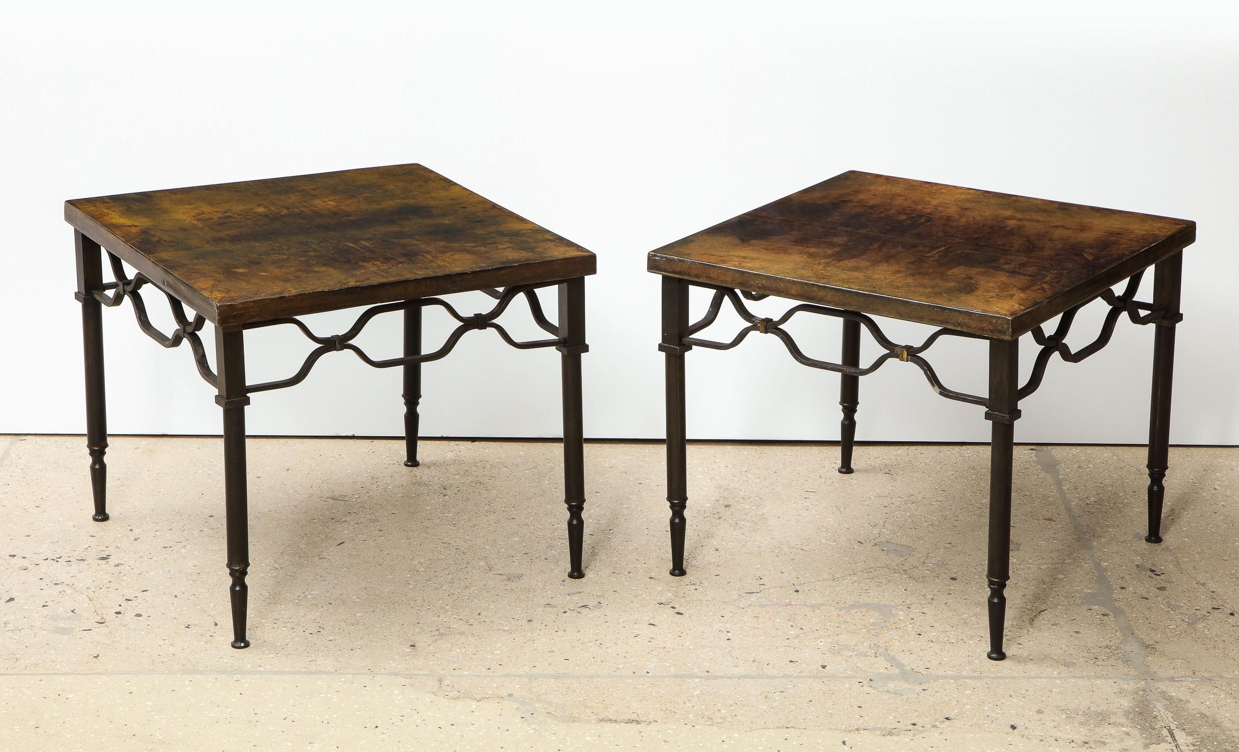 Lacquered goat skin and brass end tables by Aldo Tura.