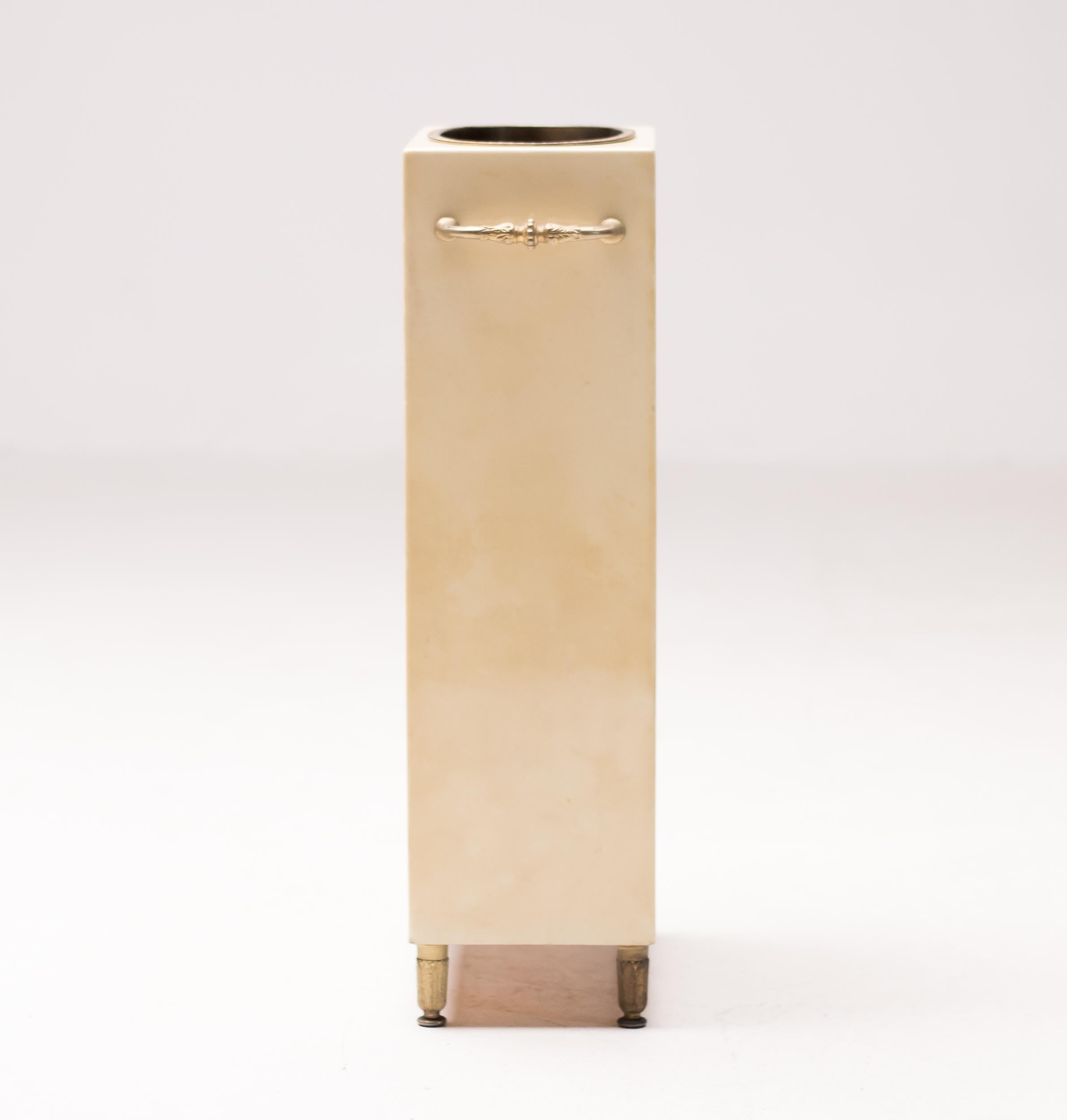 Umbrella stand covered in lacquered goatskin with brass hardware by Aldo Tura, Italy, 1970s. 
This is a rare and unique piece.
Marked on the bottom.