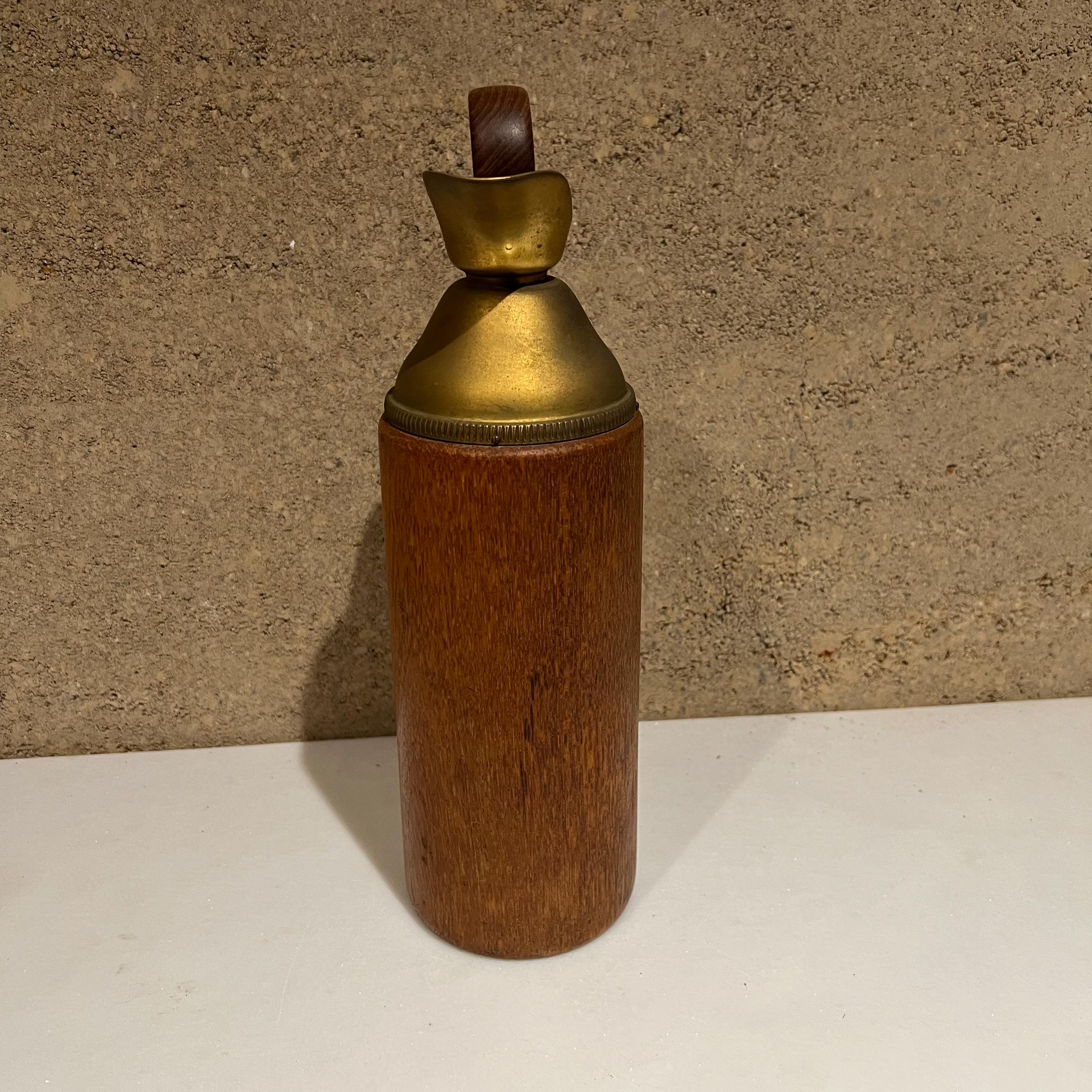 1950s Italian pitcher (carafe thermos) by Aldo Tura ITALY
Designed in Brass and Teakwood.
Unmarked.
Measures: 12.5 tall x 3.75 diameter x 5.25 depth
Brass & wood have vintage patina. 
Original cork is missing and replaced with vintage