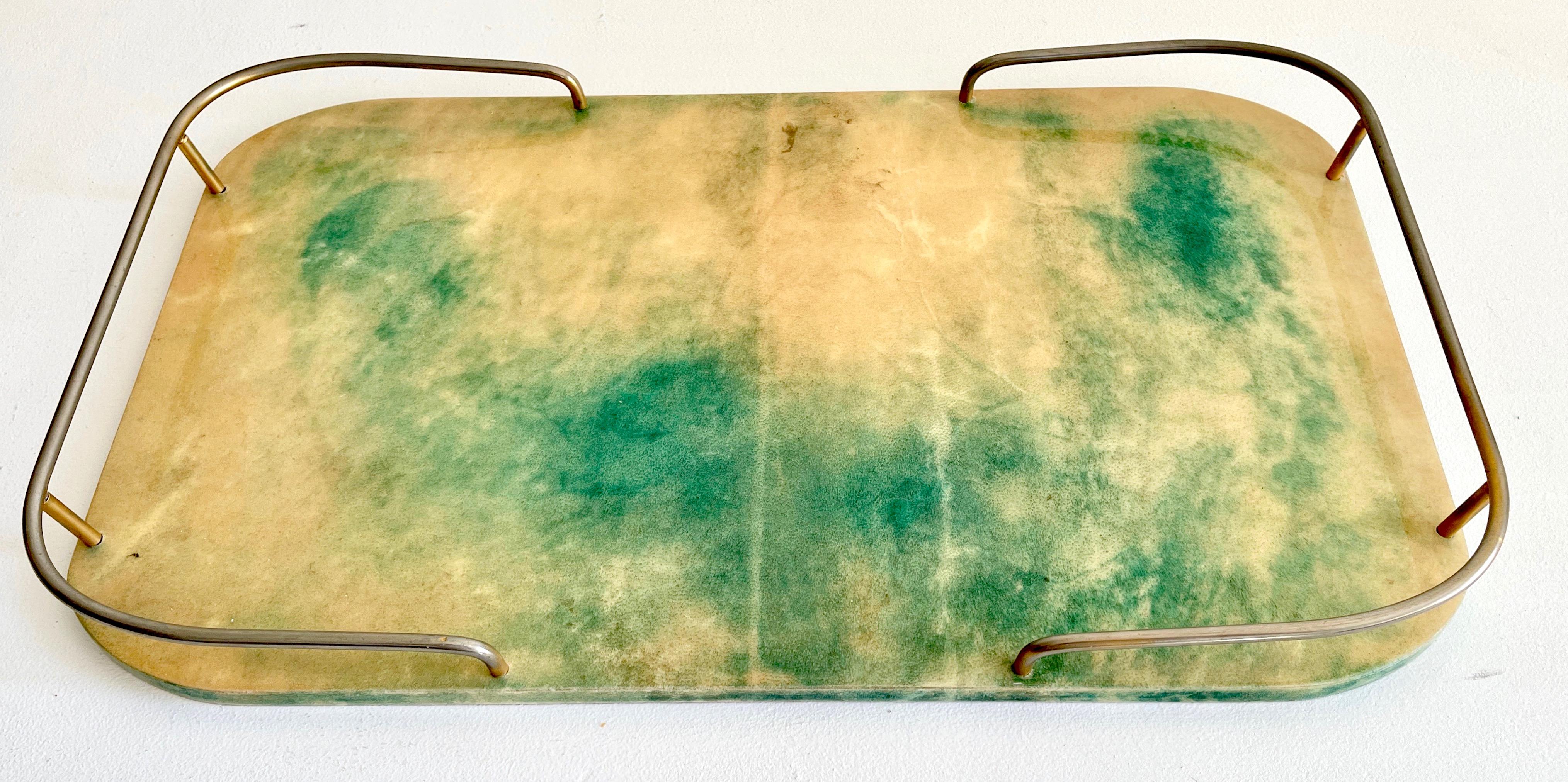 Cocktail Tray created by Italian Designer, Aldo Tura,  1960's. Lacquered goat skin over mahogany with metal railings. Durable finish. Top quality materials and craftsmanship. 
12