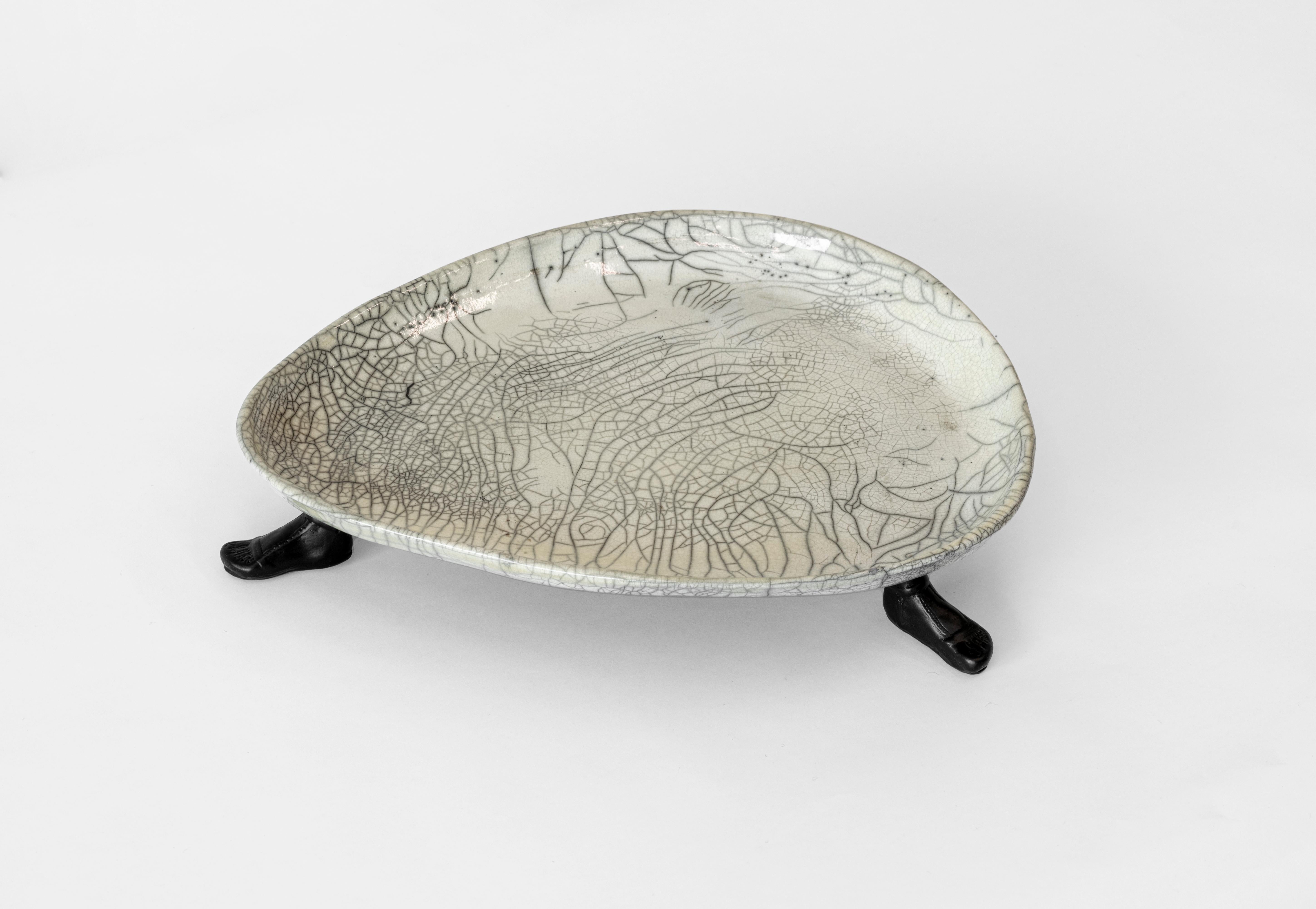 Parchment and patinated bronze tray or centerpiece by Aldus. Edition of 100.

A collaboration between Achille Salvagni and Fabio Gnessi, Aldus aims to Revive the aesthetic ideals of Greek and Latin philosophy. Functional and aesthetic objects