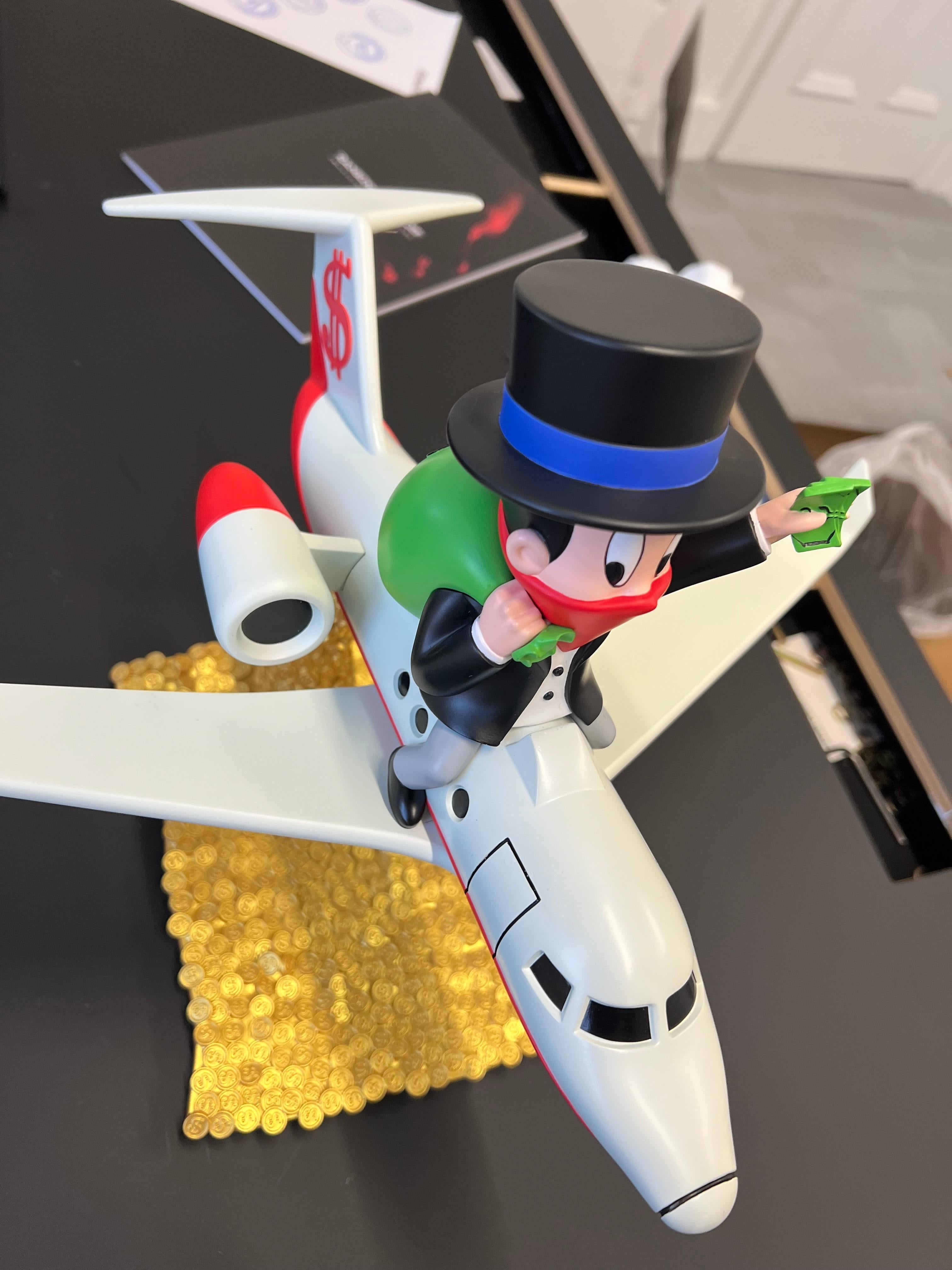 Alec Monopoly
Rich Airways, 2021
Sculpture, Painted Cast Vinyl
18 × 14 in  45.7 × 35.6 cm
Edition of 250

In his murals, cavanses, and prints, Alec Monopoly (born Alec Andon) invites his viewers to simultaneously critique and buy into ideas of