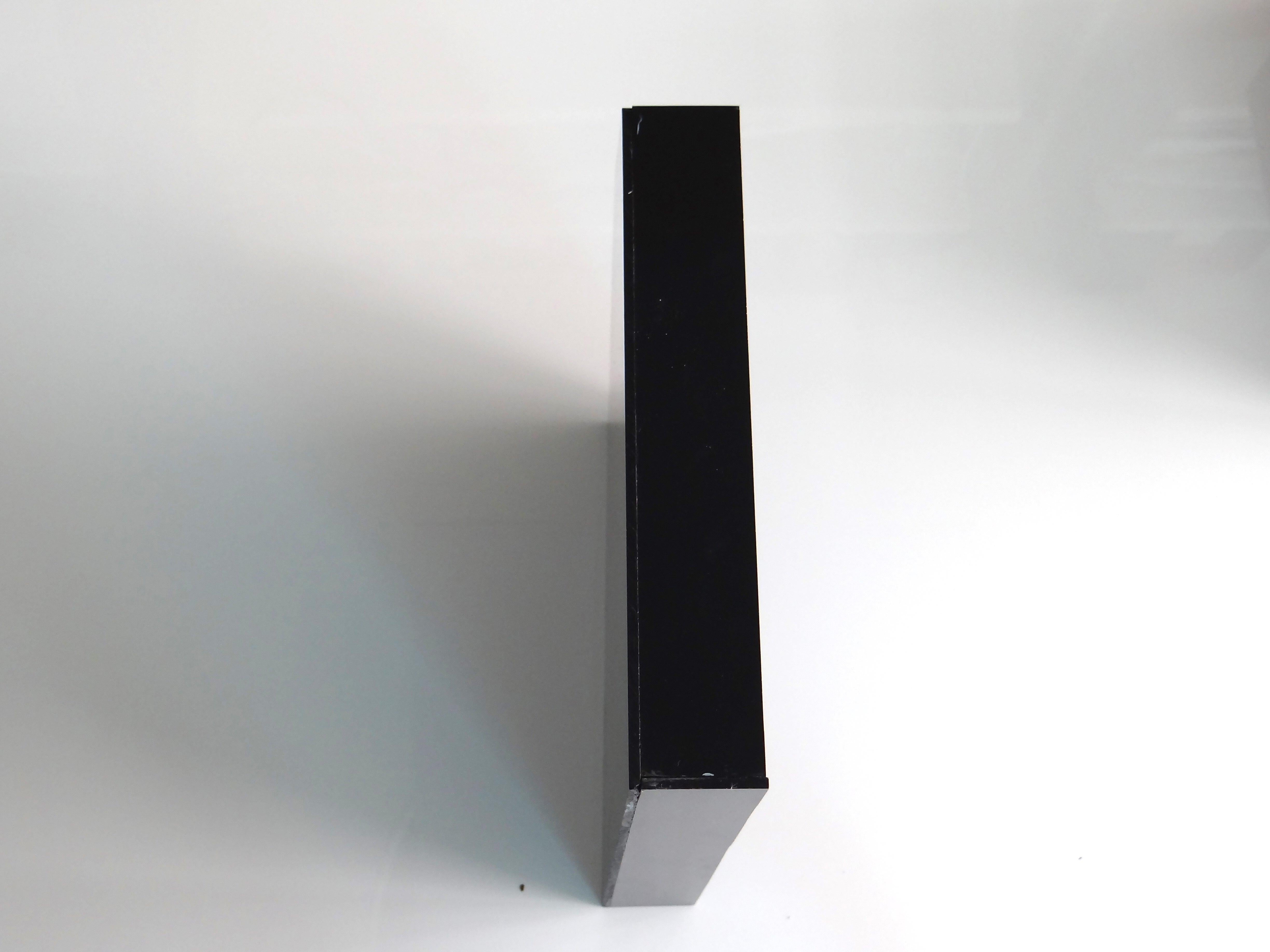 Epitafios 
Plexiglass wall sculpture

Dimensions: 10.25 in. H x 9.5 in. W x 1.4 in. D
One of a kind

Crossing between various disciplines, Valencia’s practice explores the transformative qualities of objects, language, and the built environment.