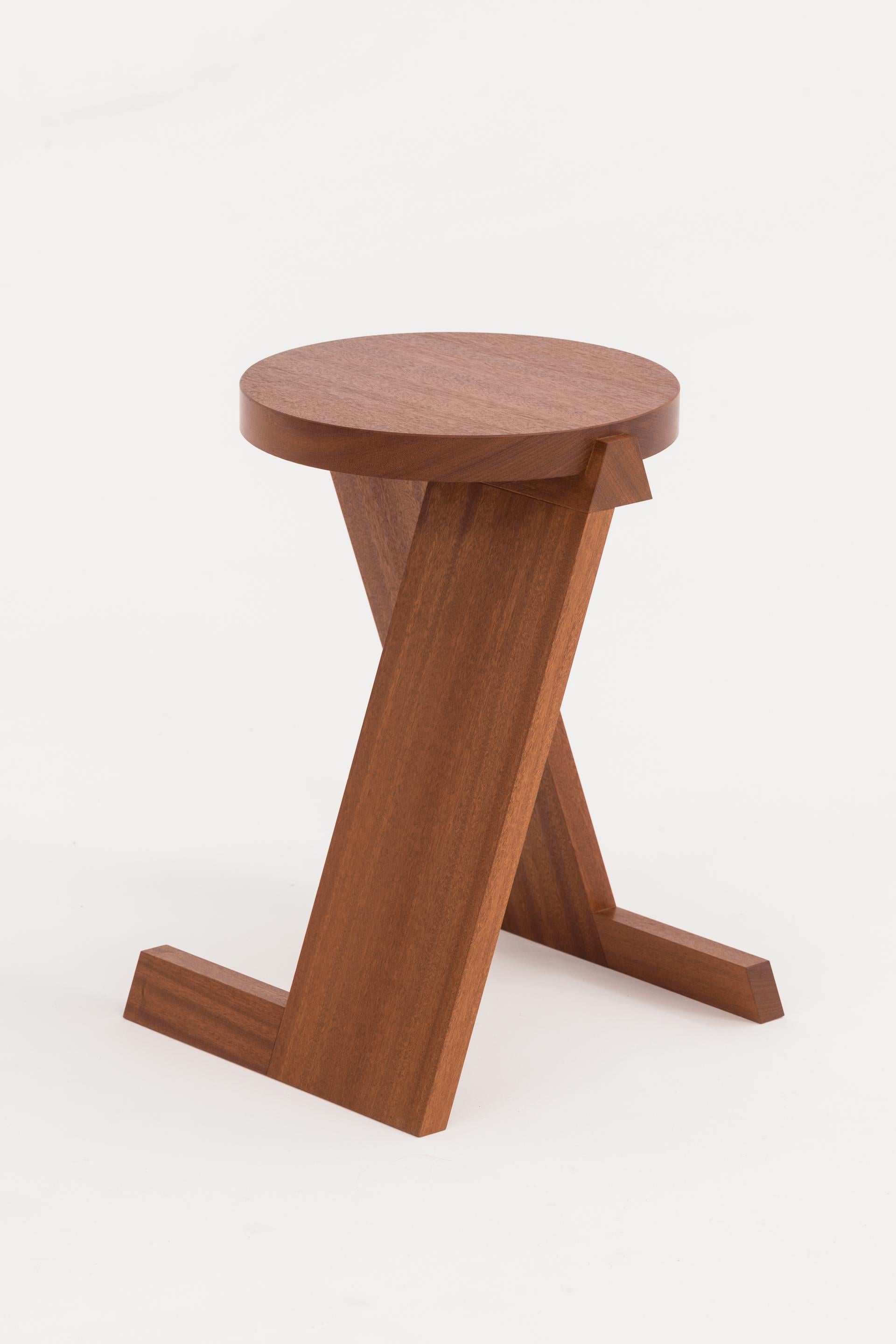 Aleksander Oniszh Pawn stool by Nów
Designed by Aleksander Oniszh
Dimensions: D 35 x W 31 x H 46 cm
Materials: american cherry, american walnut, sapelli, canadian maple.

Aleksander Oniszh:
Furniture designer and maker. He was trained in