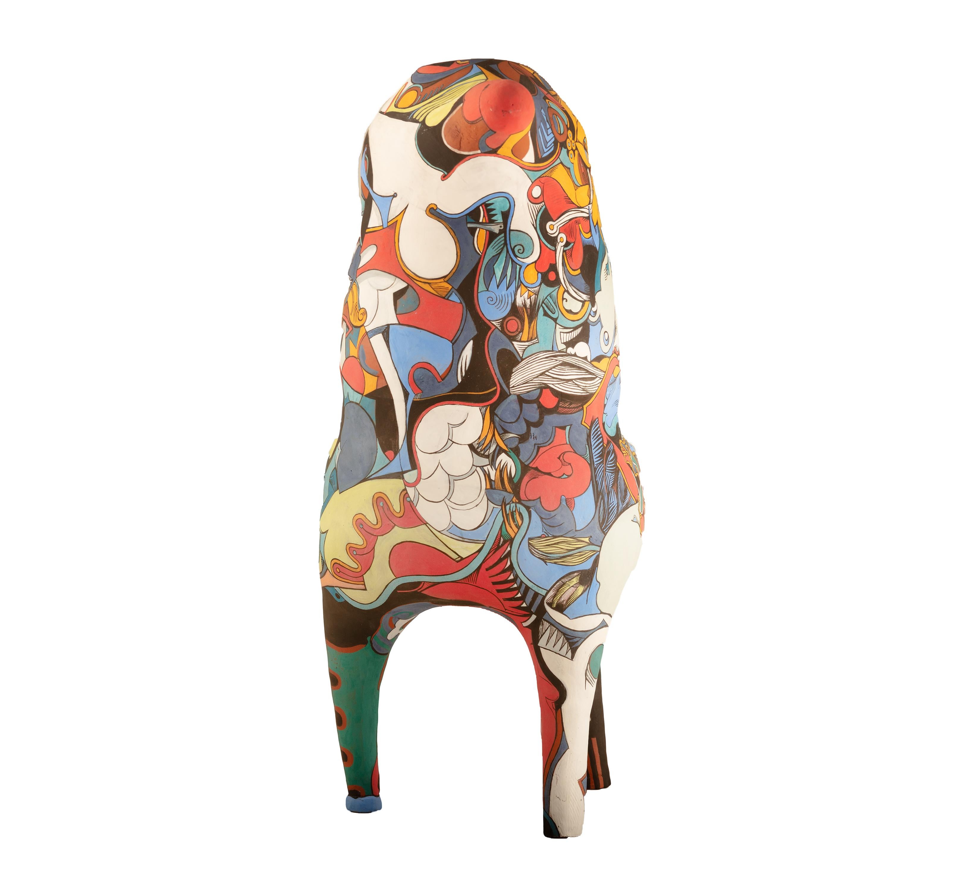 Hand-painted, sculpted and carved. Signed and dated by the artist. See close up photo of light orange area at the top of the right leg.