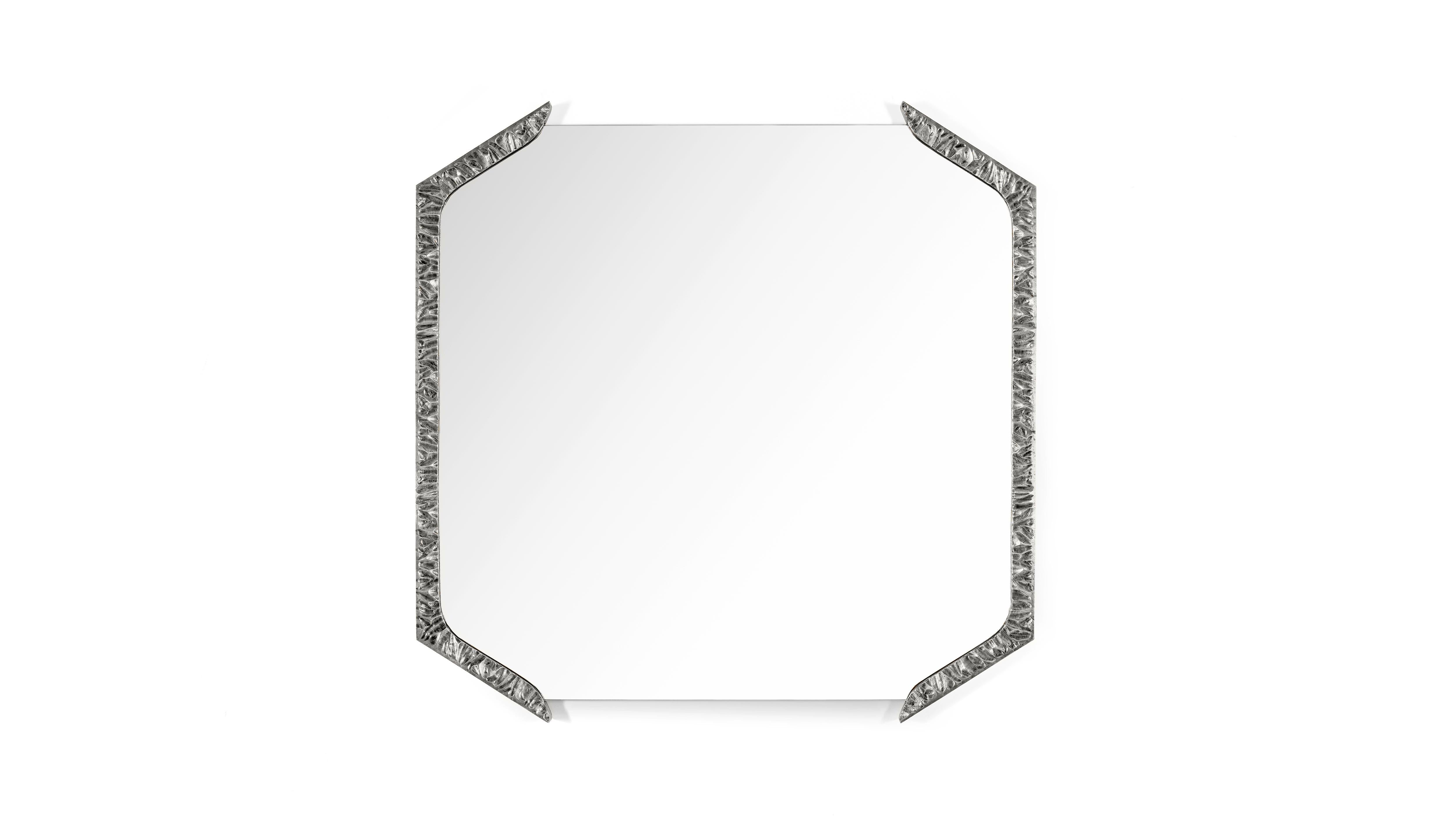 Alentejo Nickel Square Mirror by InsidherLand
Dimensions: D 3 x W 85 x H 85 cm.
Materials: Cast brass covered by nickel bath, clear mirror.
22 kg.
Available in other finishes.

Alentejo mirror has the similar conceptual approach to the typical cork