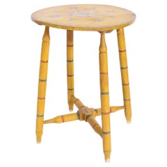 Alentejo yellow painted round side table, 1950s.