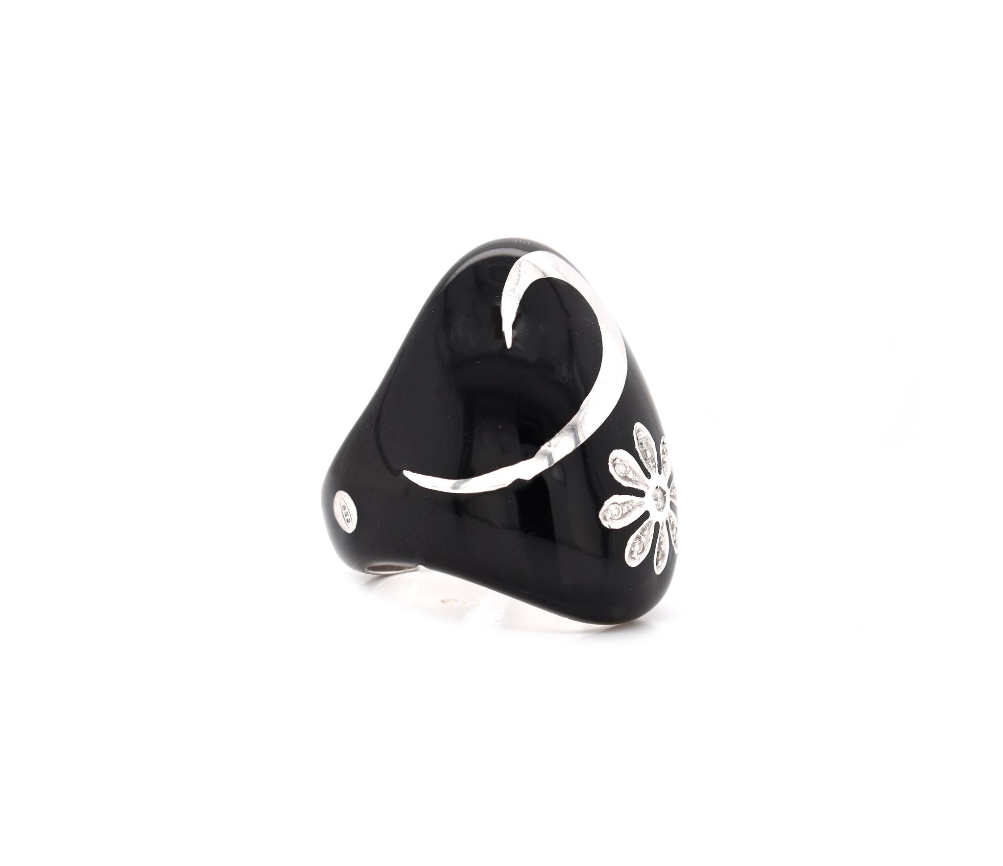 Designer: Alessadro Fanfani
Material: 18K white gold & black enamel
Diamond: 10 round brilliant cut = .10cttw
Color: G
Clarity: VS
Size: 7
Dimensions: ring measures 29mm wide
Weight: 19.96 grams
