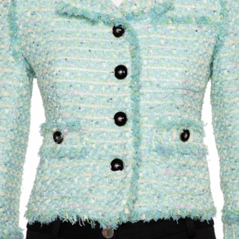 Tailored in a sophisticated design, this jacket from Alessandra Rich is surely a must-have. Flaunt current trends with this exclusive aqua green tweed jacket. This casual jacket is designed for the fashionista that you are.