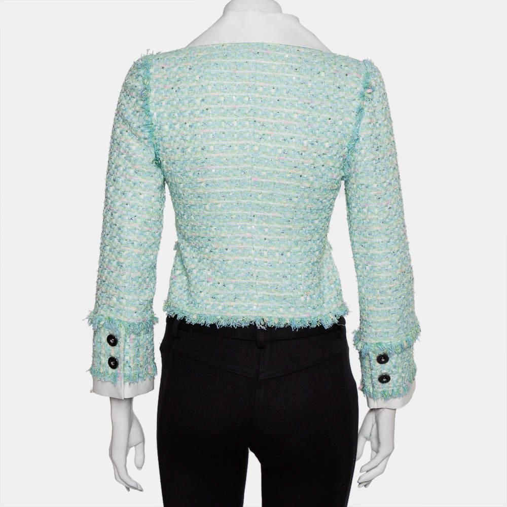 Tailored in a sophisticated design, this jacket from Alessandra Rich is surely a must-have. Flaunt current trends with this exclusive aqua green tweed jacket. This casual jacket is designed for the fashionista that you are.

Includes: Brand Tags