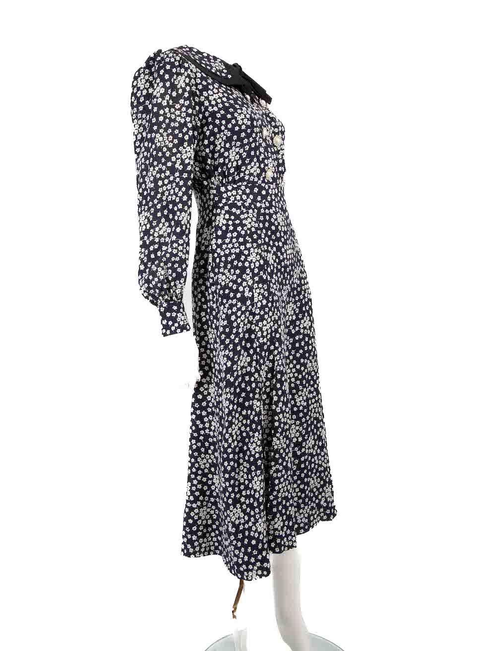 CONDITION is Very good. Minimal wear to dress is evident. One loose button and loose threads to the first two buttons on this used Alessandra Rich designer resale item.
 
 
 
 
 
 Details
 
 
 Navy
 
 Silk
 
 Dress
 
 Floral print
 
 Midi
 
 Round