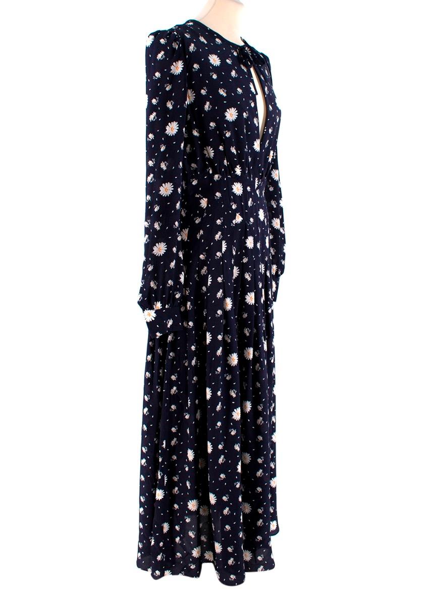 Alessandra Rich Navy Silk Keyhole Neck Daisy Print Long Dress

- Signature 30's style silhouette
- Deep keyhole detailed front bodice, with a small self-tie bow a the neck
- All over ditzy white & yellow daisy print on a navy background
- Pintucked