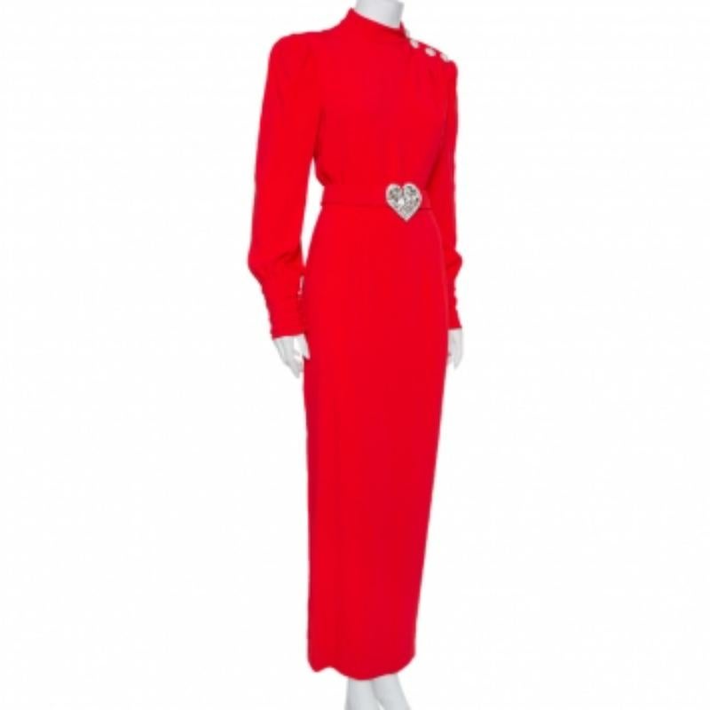You'll find occasions to wear this beautiful gown from Alessandra Rich! The red crepe creation features a flattering silhouette that is enhanced with an embellished heart belt on the waist, button detailing on the left shoulder, and long sleeves
