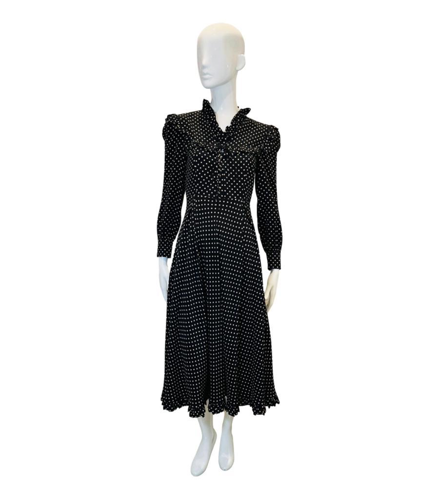 Alessandra Rich Silk Polka-Dot Dress
Black midi dress designed with all-over polka-dot pattern in white.
Styled with ruffle detail to the chest, shoulders and to self-tie V-Neckline.
Featuring buttoned cuffs and flared, frill trimmed skirt. 
Size –