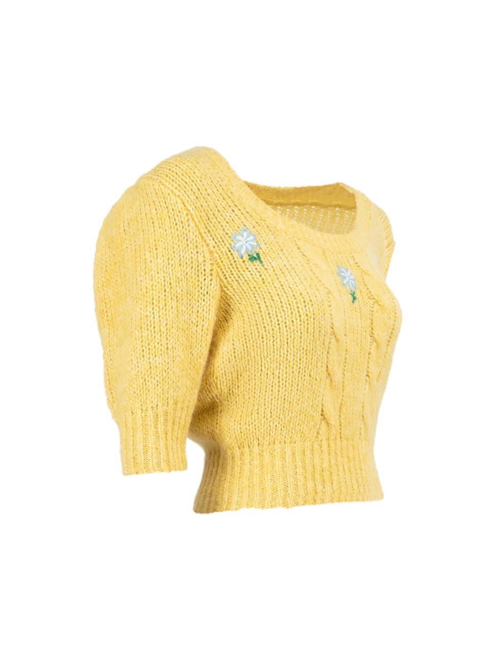 CONDITION is Very good. Hardly any visible wear to knitwear is evident on this used Alessandra Rich designer resale item.

Details
Yellow
Alpaca
Cable knit top
Short sleeves
Round neckline
Floral embroidery
Cropped 

Made in Italy 

Composition
25%