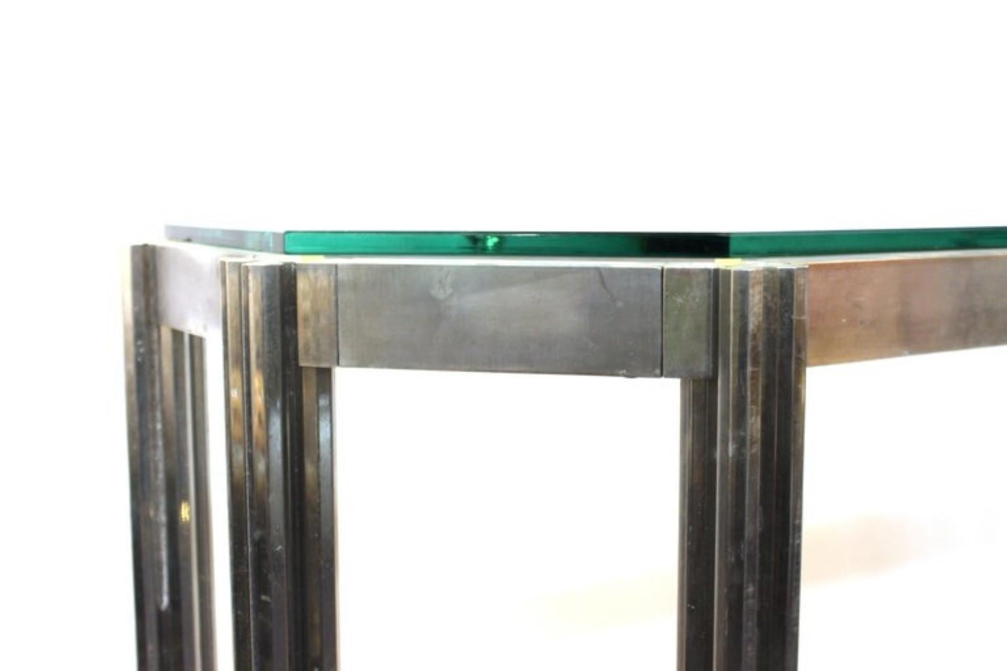 Alessandro Albrizzi Mid-Century Modern Chrome Console Table

Design: Chrome console table with glass top, featuring an articulated frame and six octagonal bar legs.

Dimensions: 35