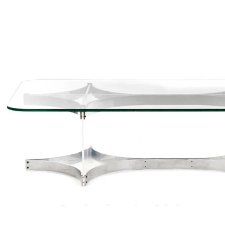 Large rectangular coffee table with glass top on lucite and chrome support. Alessandro Albrizzzi for Albrizzi.
London 1972
180cm L x 80cm W x 40cm D.