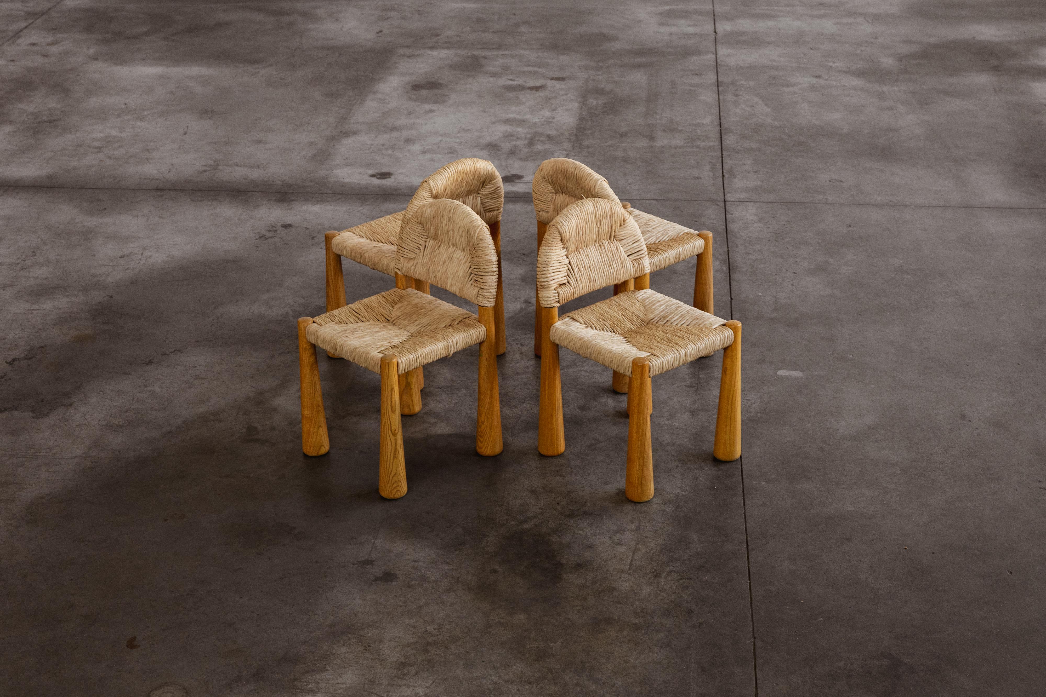 Alessandro Becchi “Toscanolla” dining chairs for Giovannetti, ash and straw, Italy, 1970, set of four.

This rare 