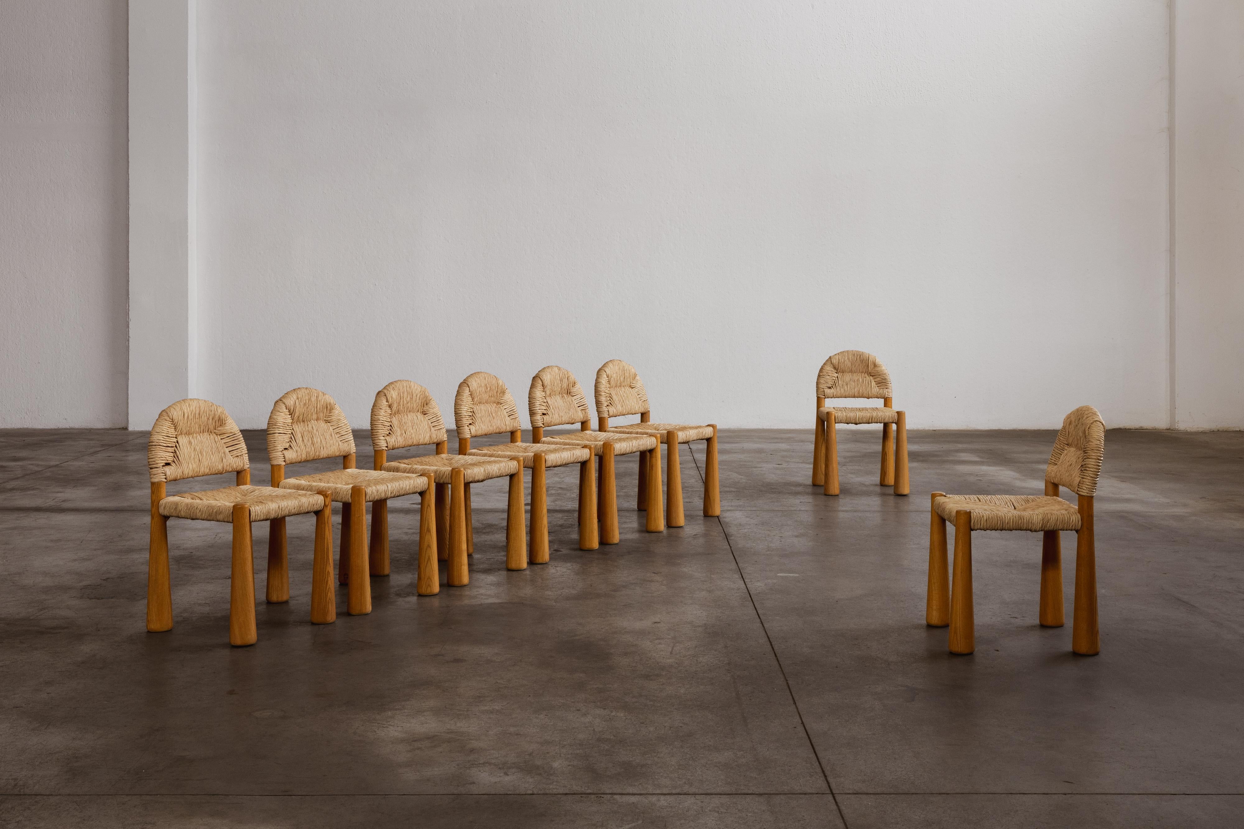 Alessandro Becchi “Toscanolla” dining chairs for Giovannetti, ash and straw, Italy, 1970, set of eigth.

This rare 
