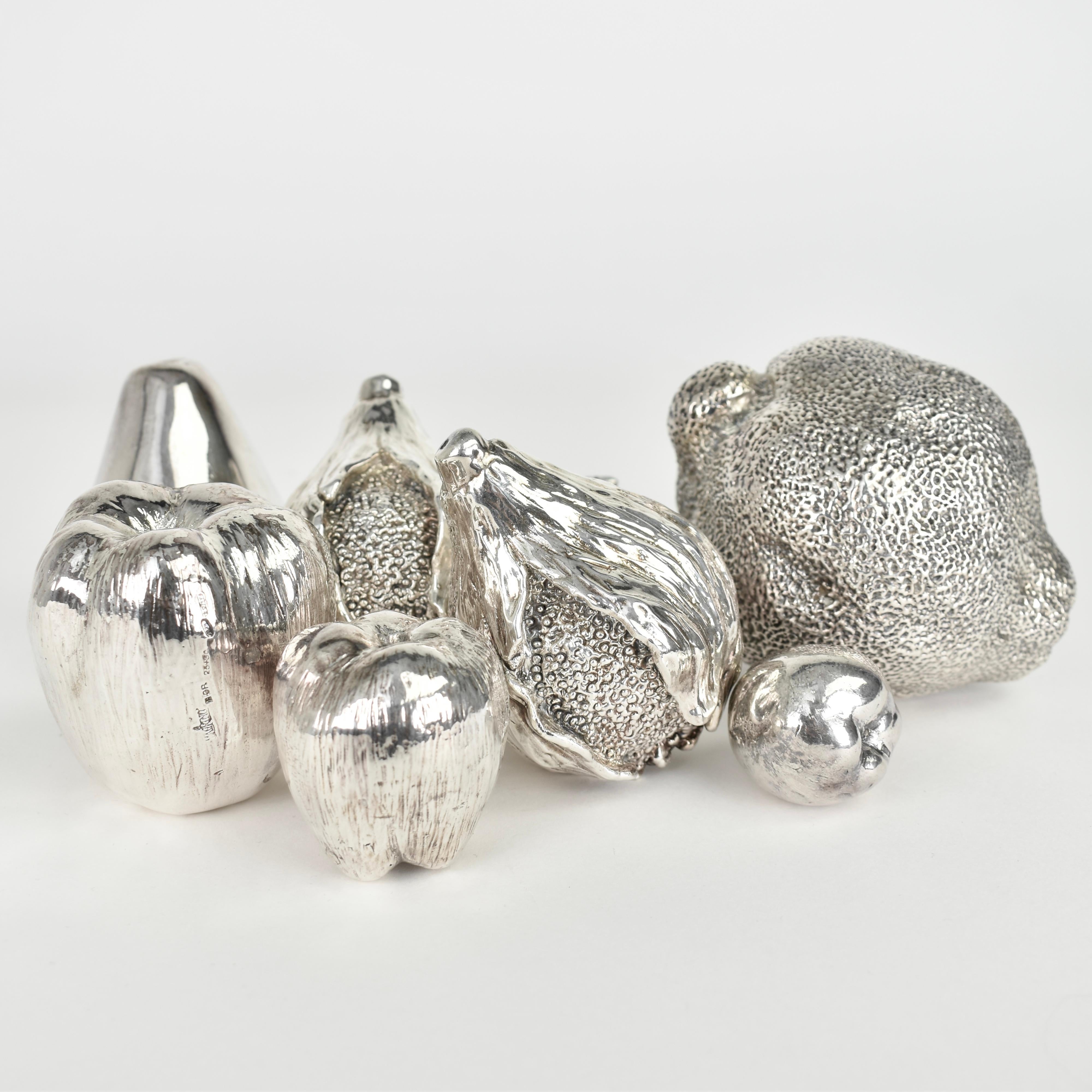 Bring timeless Italian elegance into your home with this rare collection of handmade vintage fruit figurines by renowned artisan Alessandro Magrino. Highly decorative and realistically modelled, this set includes eight beautifully sculpted pieces: a