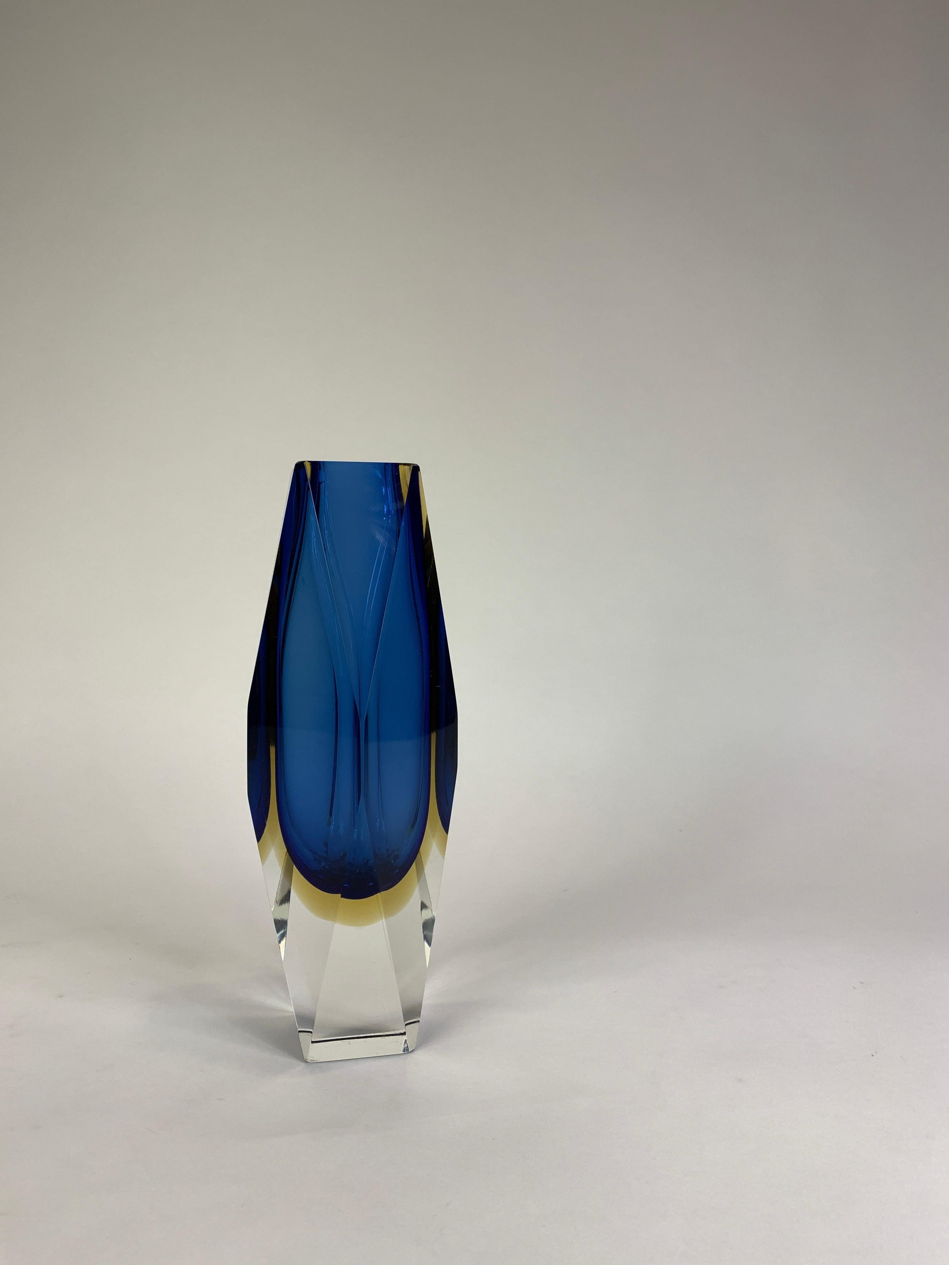 A Mid-Century Modern cobalt blue to yellow to clear faceted Murano glass vase by Alessandro Mandruzzato.