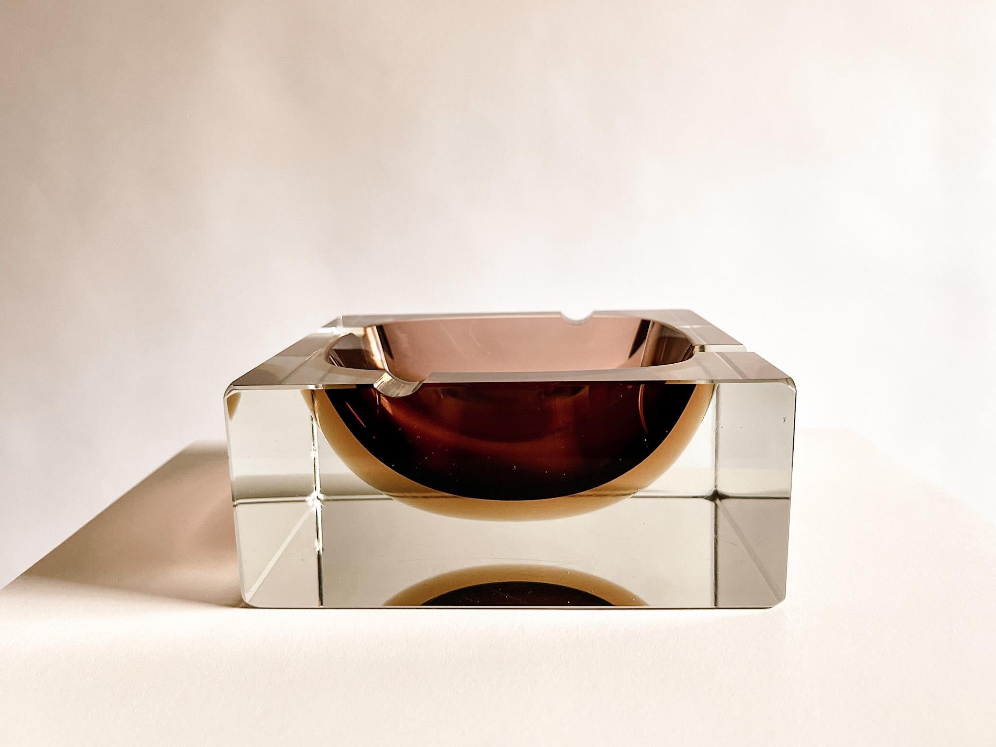 Classic, stunning faceted Sommerso Murano glass matching ashtray and lighter in deep purple and yellow/gold color made by Alessandro Mandruzzato. Looks amazing from any angle. In very good vintage condition. No noticeable cracks or other chips.