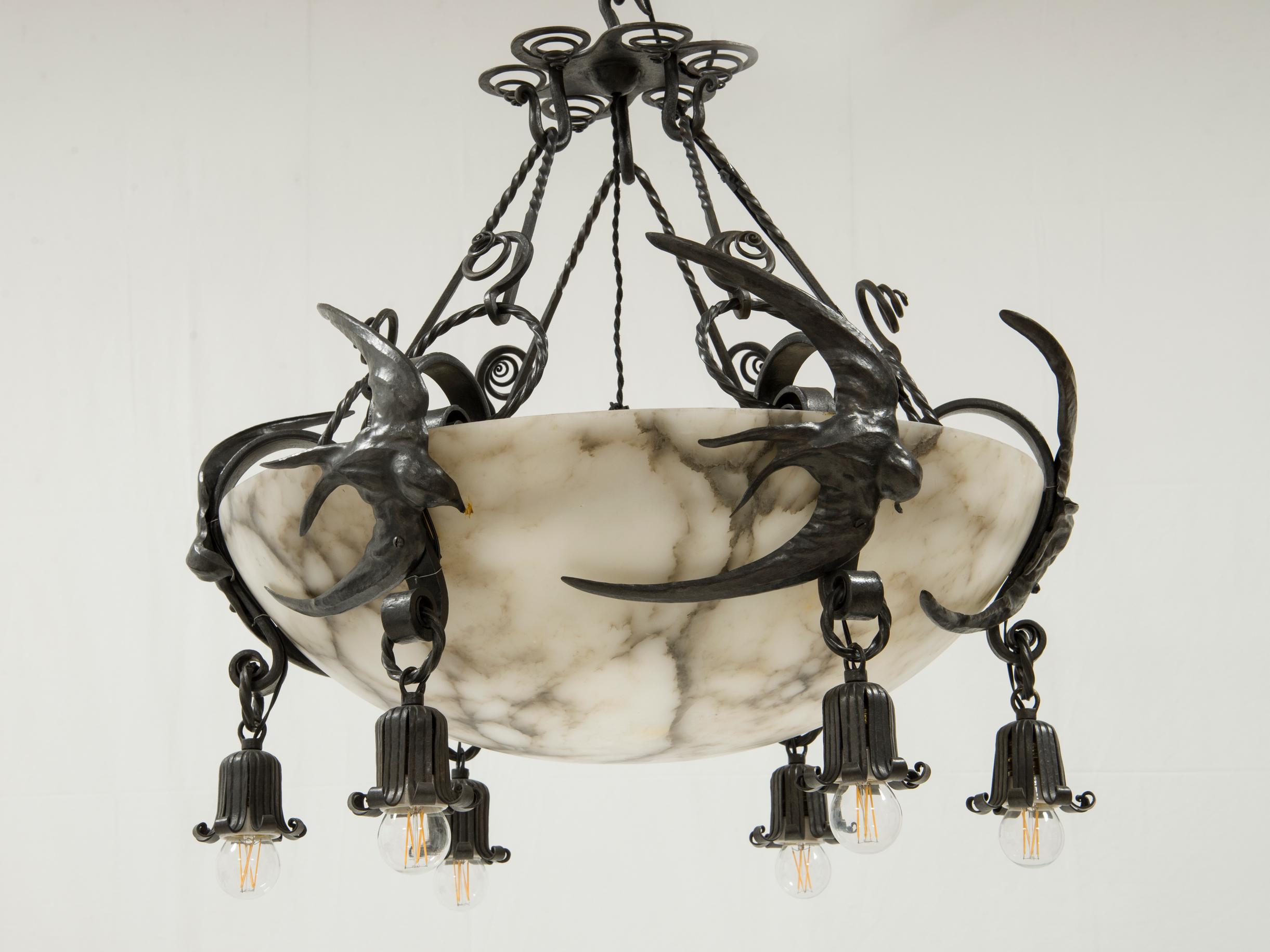 Alessandro Mazzucotelli
Swallow chandelier
Wrought iron, alabaster
Italy, circa 1920
H 68 x D 58 cm