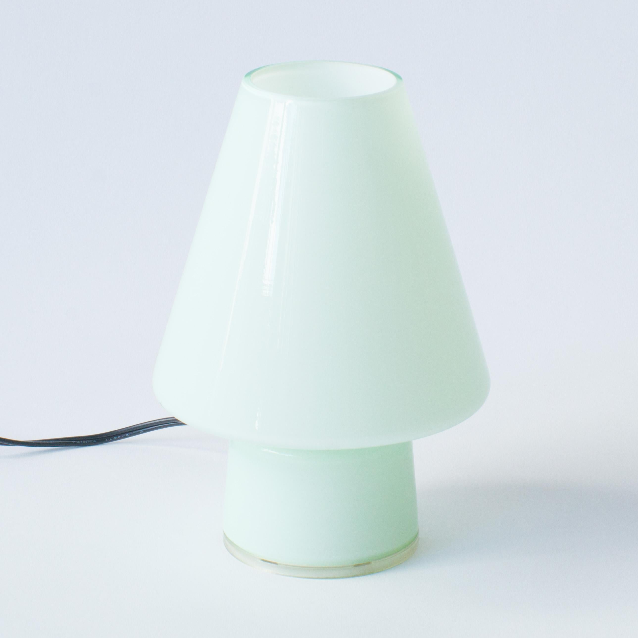 Alessandro Mendini Bibi lamp for Artemide. Color is pale green.
Working with 100-240V. E17 light bulb.