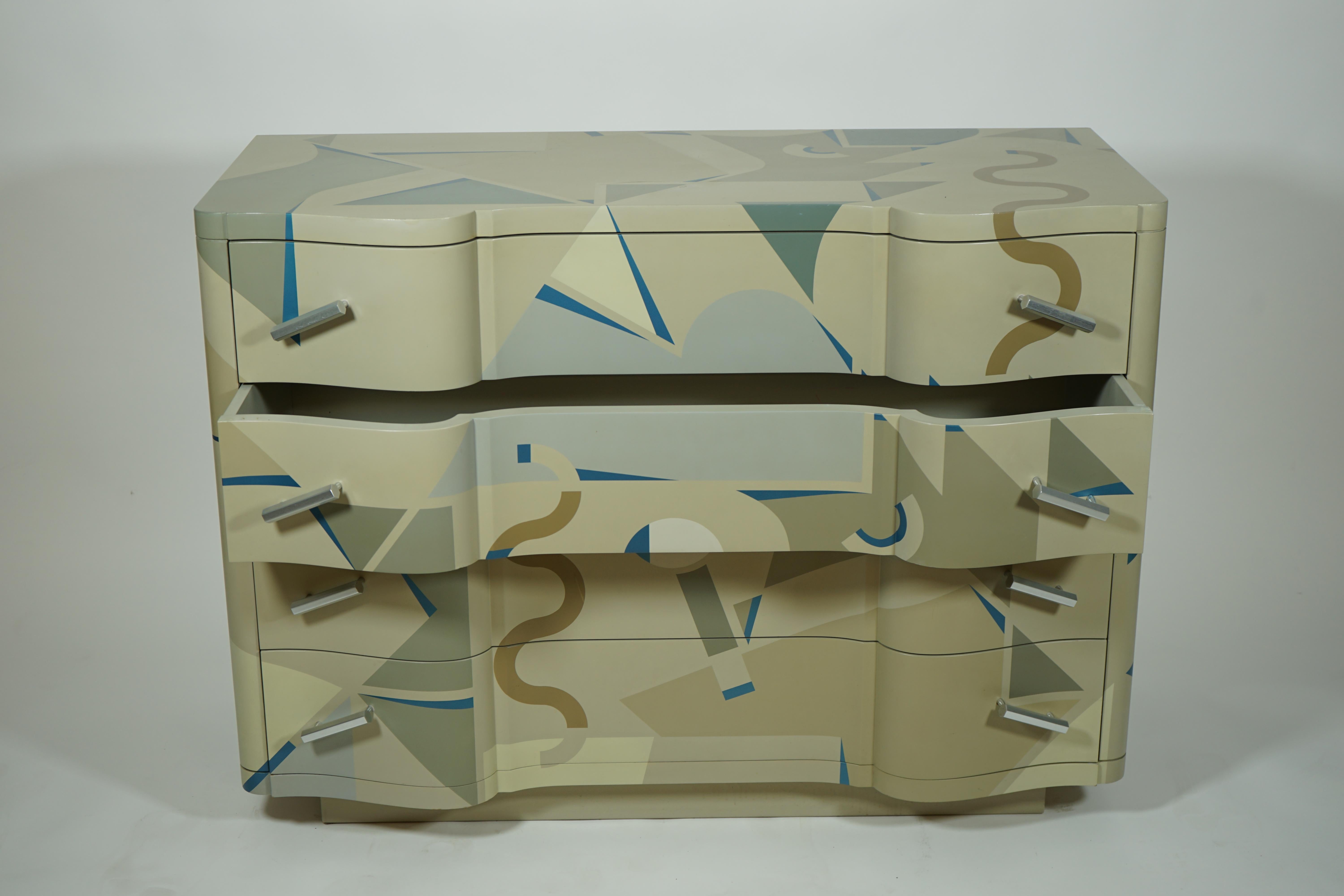 Original chest of drawers designed by Alessandro Mendini for the Alchimia in 1984.
Lacquered wood, handpainted decoration and aluminum. Signed.

About Alchimia
In 1976 Alessandro and Adriana Guerriero established Alchimia, the first example of