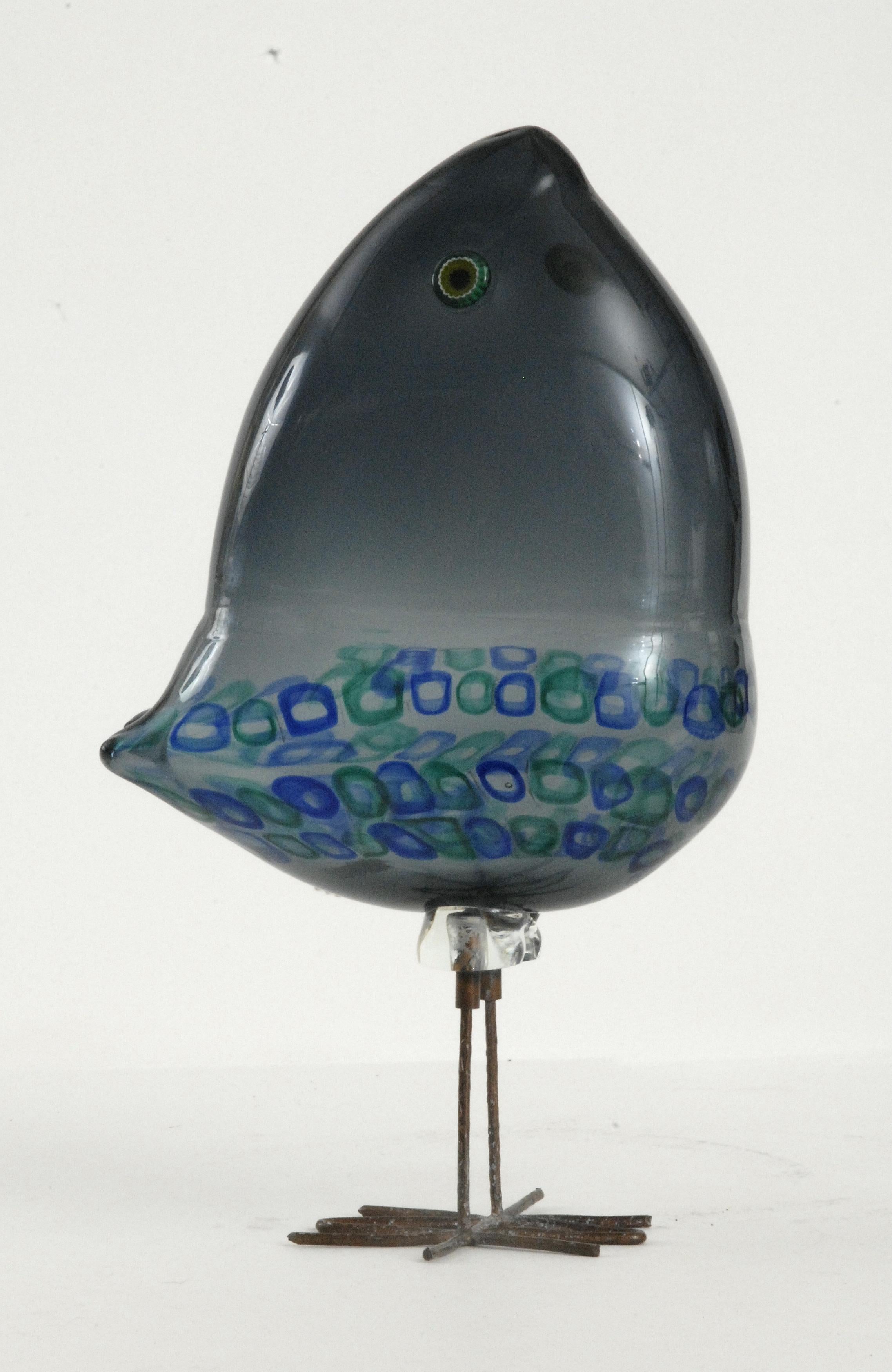 A rare blue grey glass 'Pulcino' with murrine glass eyes and copper feet. Made by Vistosi at Murano in Italy. Designed by Alessandro Pianon in 1963.
With its original Vistosi paper label.