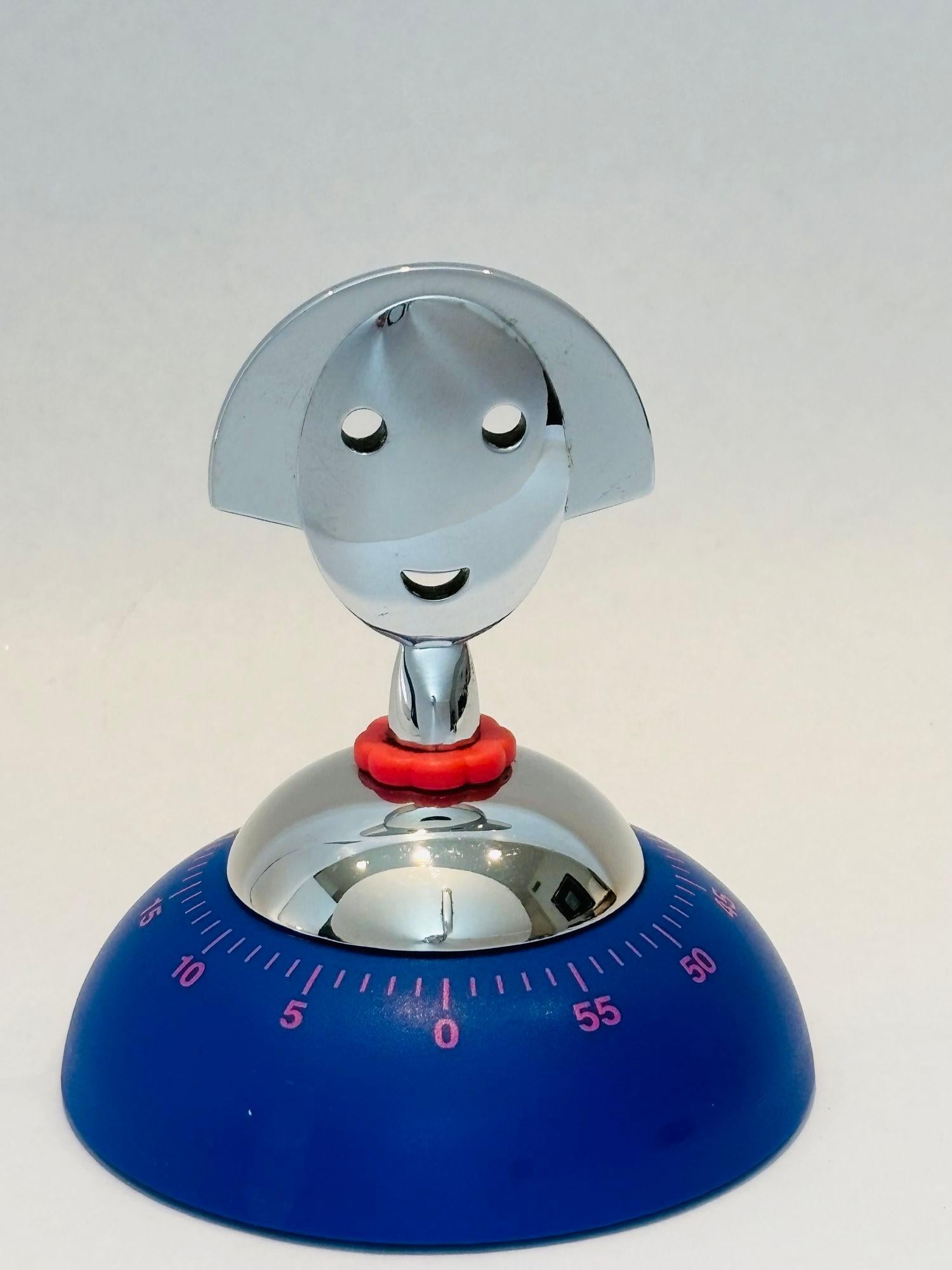 Temporizador de cocina Alessi Anna de Alessandro Mendini en color Azul.
Reloj mecánico vintage Alessi azul, rojo y cromado 