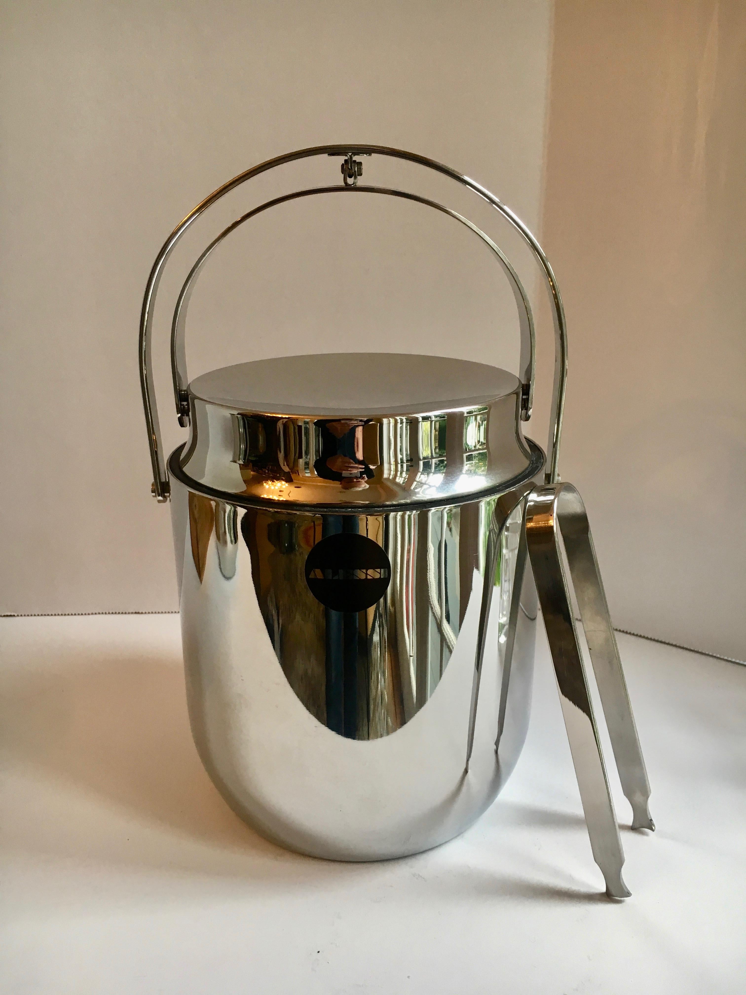 Alessi ice bucket tongs and pitcher - stainless steel and in perfect condition, ice bucket has removable plastic liner with drainage holes - pitcher and tongs match. We have left on the Alessi sticker, but the black dot can be easily removed 

The