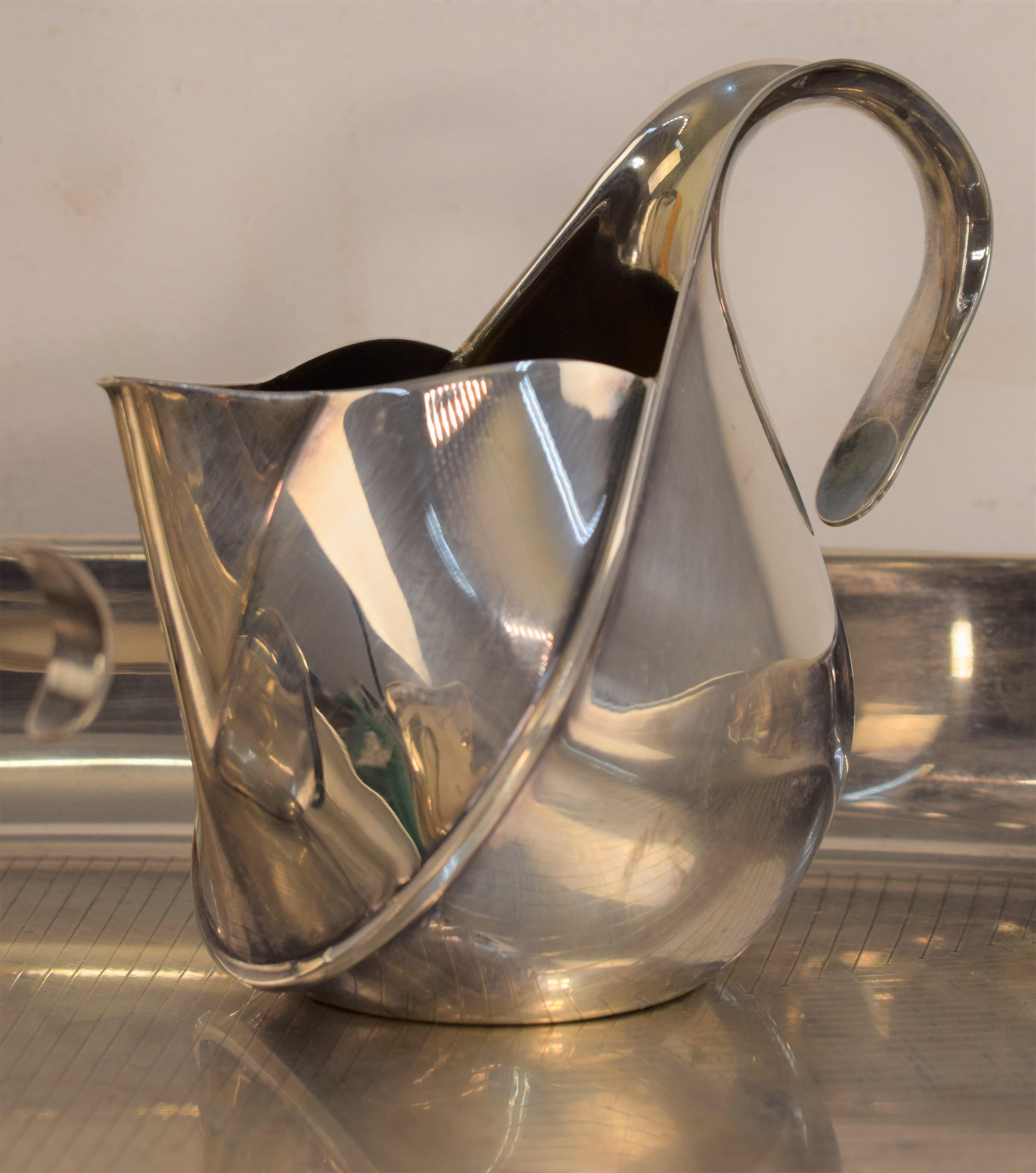 Alessi Silver Wet Steel Tea Set Oronda “Oscar Tusquets”, 1983. In Good Condition In Palermo, PA